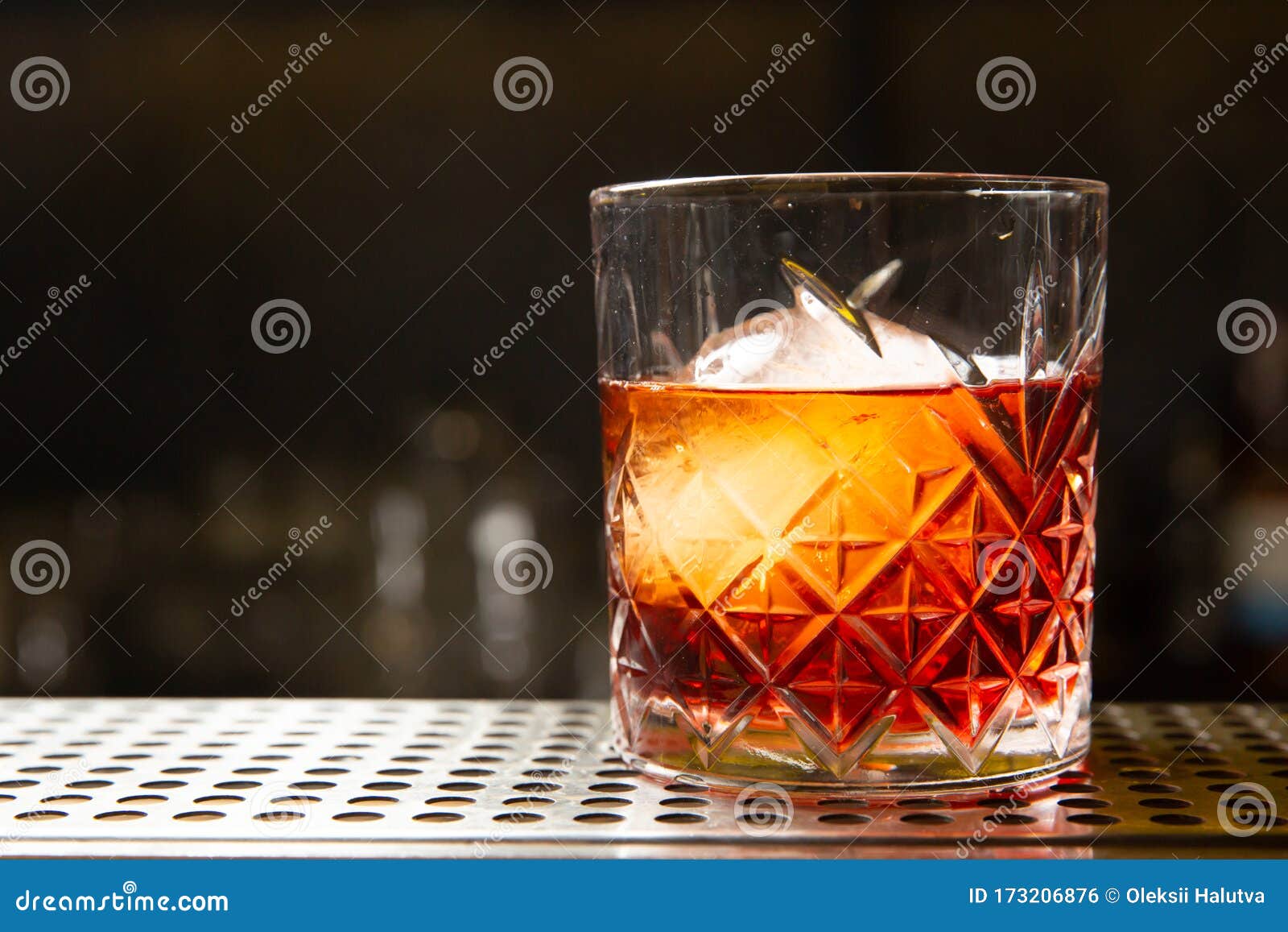 Whiskey with an Ice Ball in a Glass. Stock Photo - Image of lounge, dark:  173206876