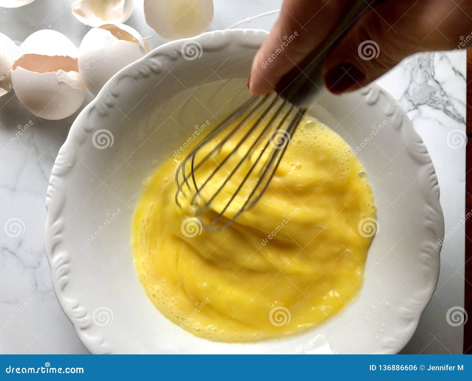 Whisking egg yolks stock photo. Image of closeup, broken 136886606