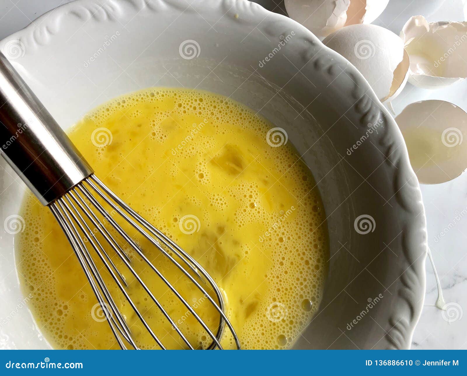 Whisking egg yolks stock photo. Image of eating, closeup 136886610