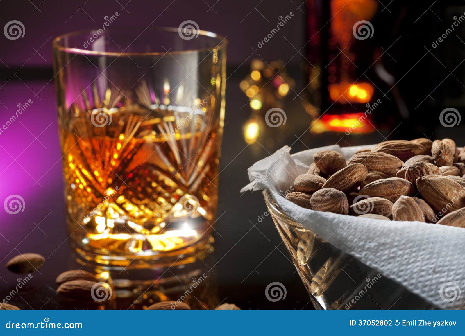 Whisky with almonds stock photo. Image of categories 37052802