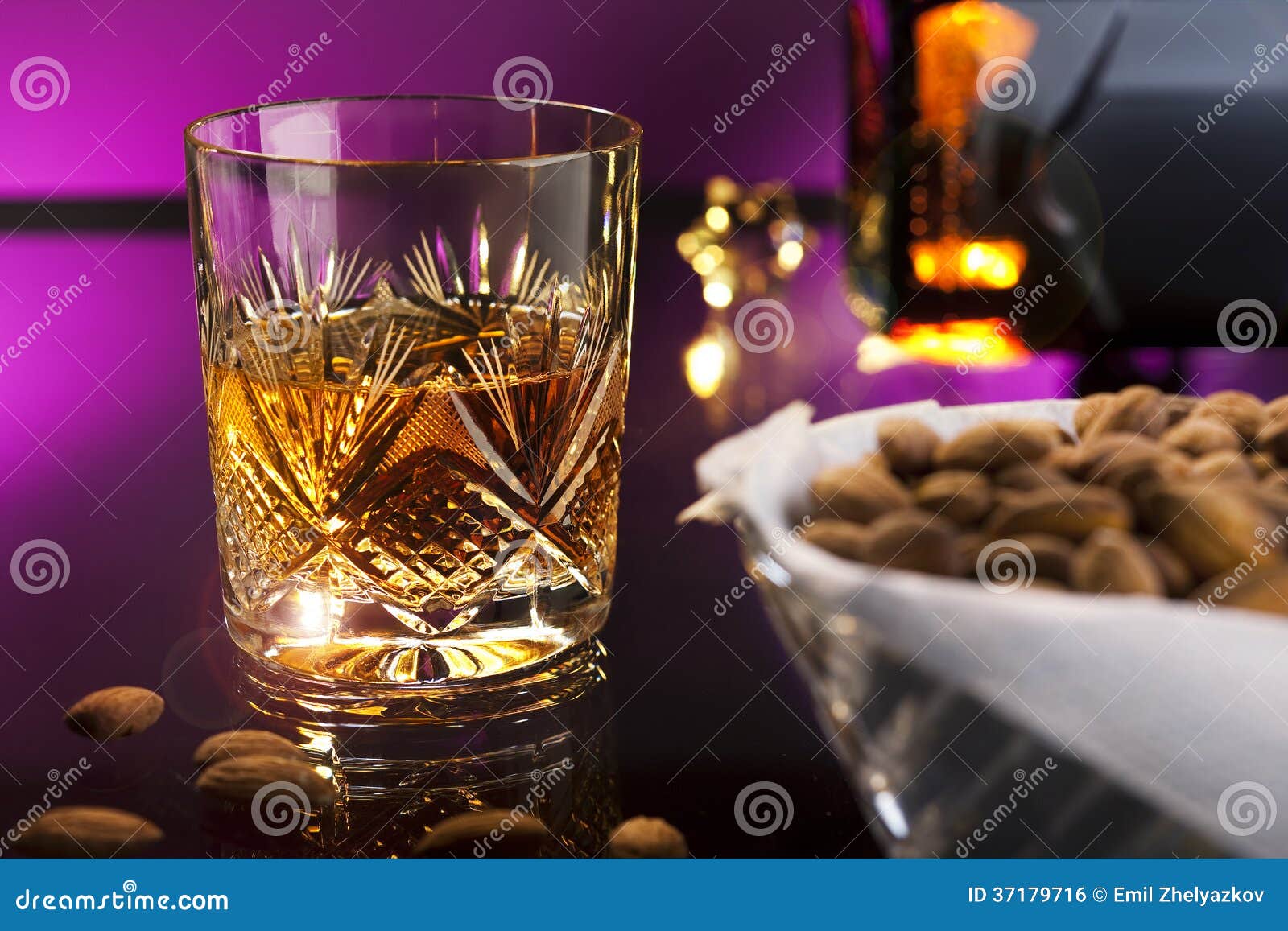 Whisky with almonds stock photo. Image of alcohol, elegance 37179716