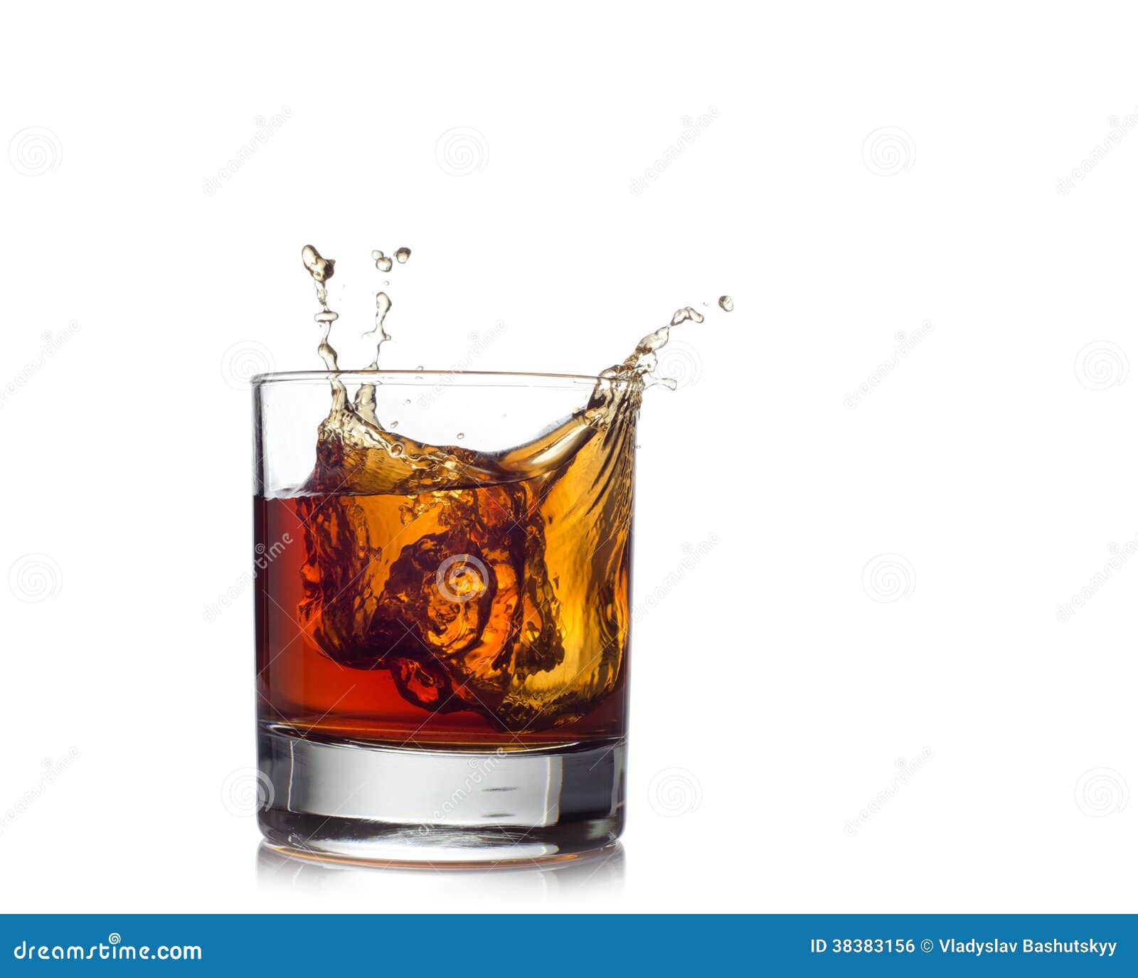 Splash in glass of whiskey and ice isolated, Stock image