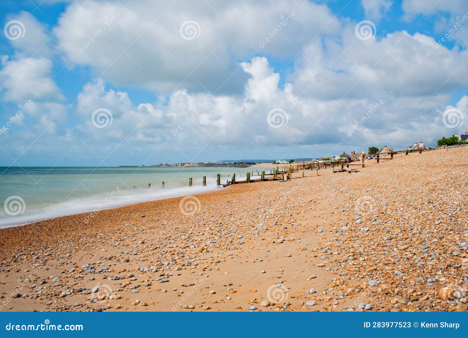 Whispy Waves on an Early Morning at Pevensey Bay Beach Stock Image