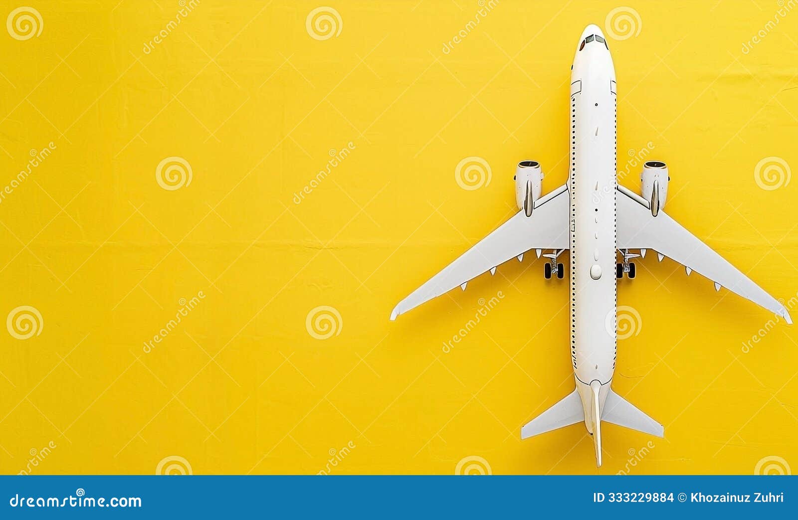 white airplane on yellow background - travel and journey concept