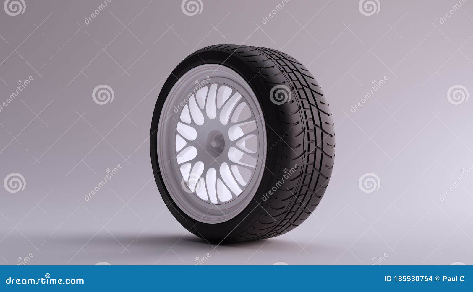white alloy rim wheel with a complex multi spoke  with racing tyre