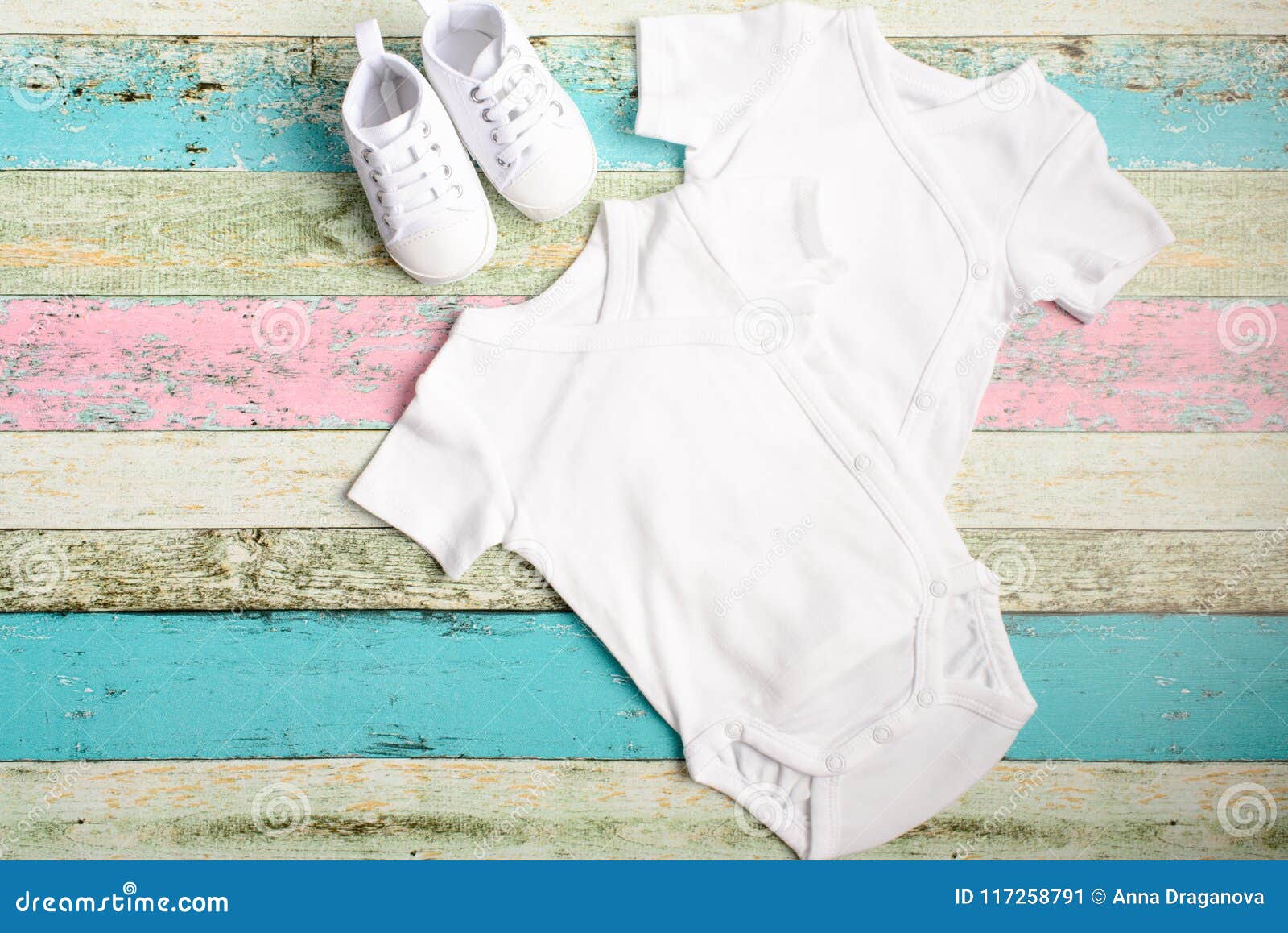 Download White Baby Onesie And Sneakers Over Pastel Wooden Background Good For Insert Your Design Mock Up Stock Image Image Of Space Shoes 117258791