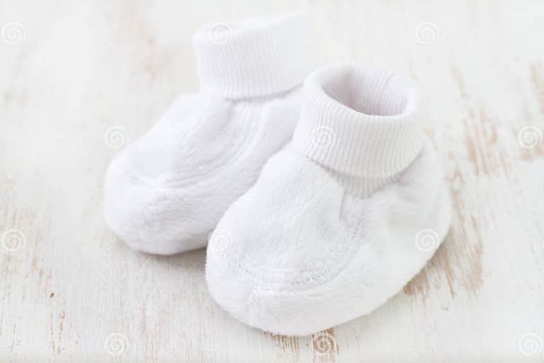 White baby socks on white stock image. Image of child 45430743