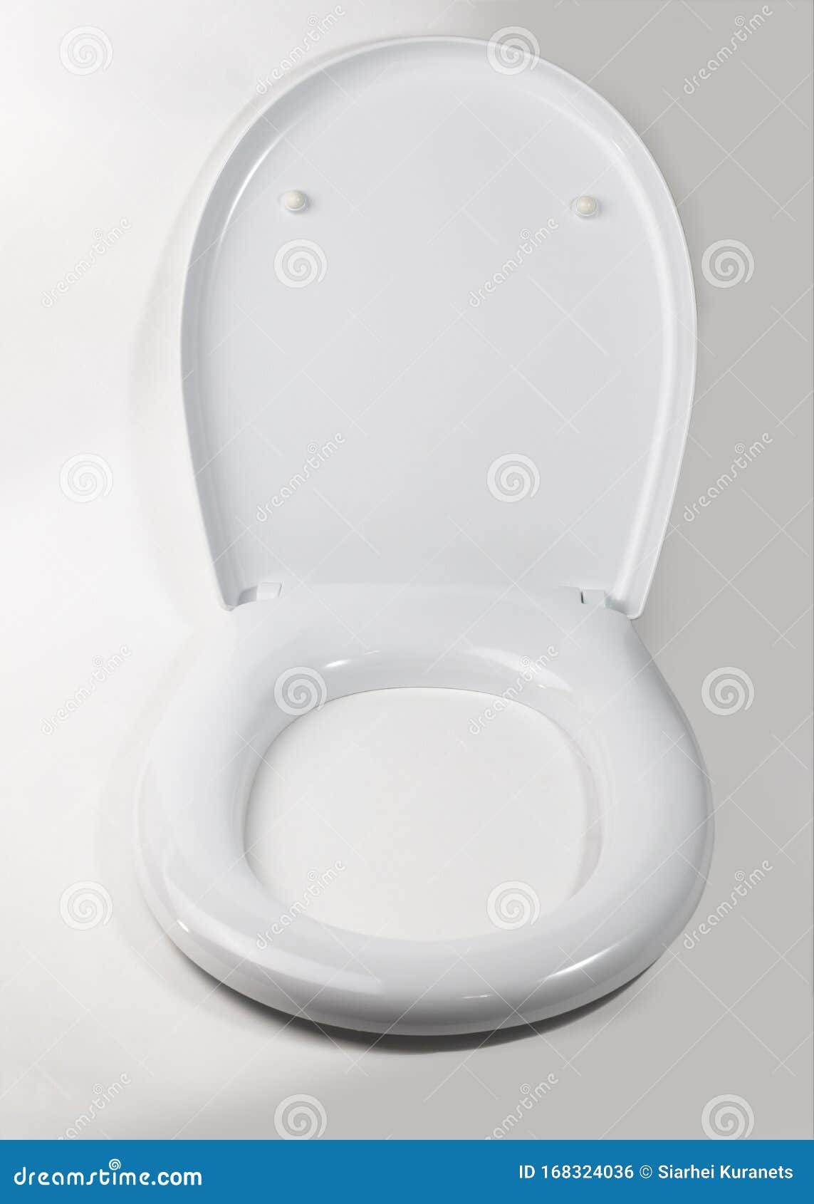 On a White Background, a Toilet Lid. Closeup Stock Photo Image of