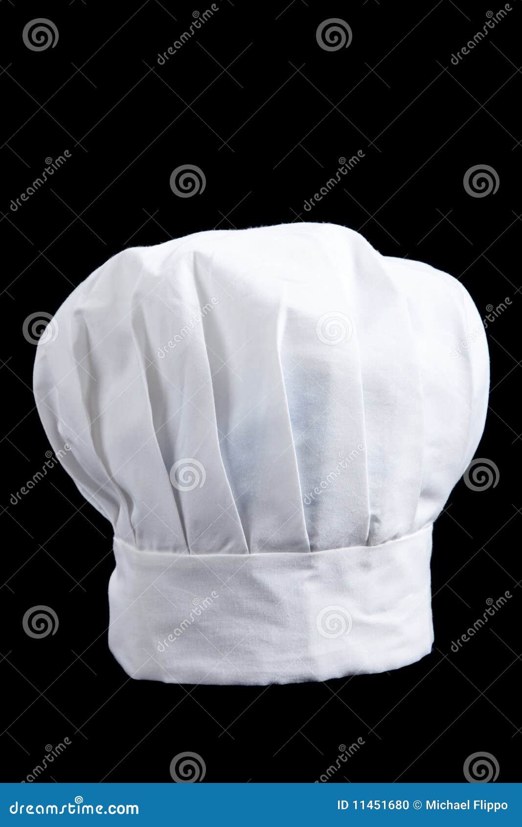 a white baker's toque on a black background
