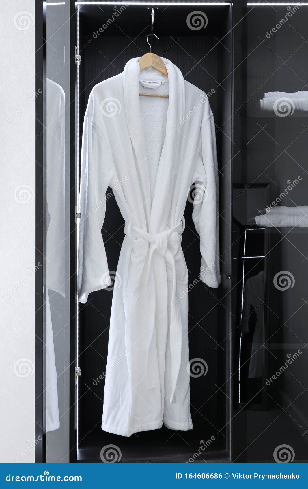 White Bathrobe Hanging in the Closet Stock Photo Image of clothing