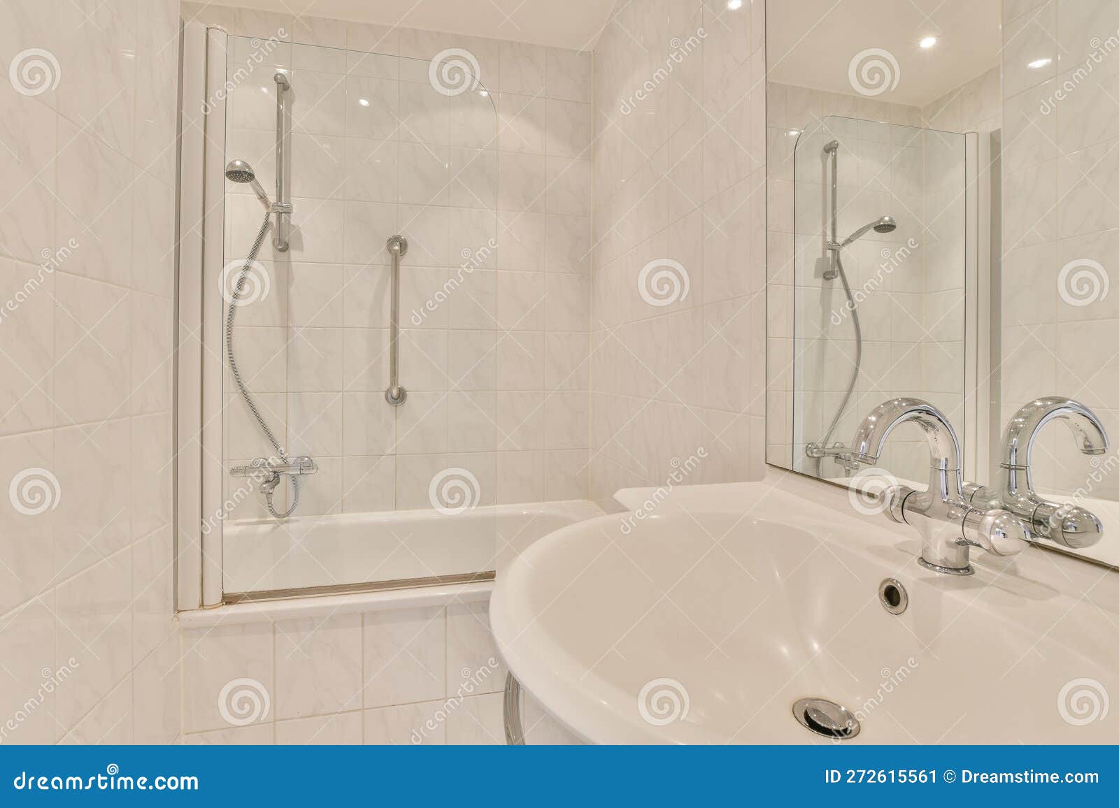A White Bathroom with a Shower and a Sink Stock Image Image of