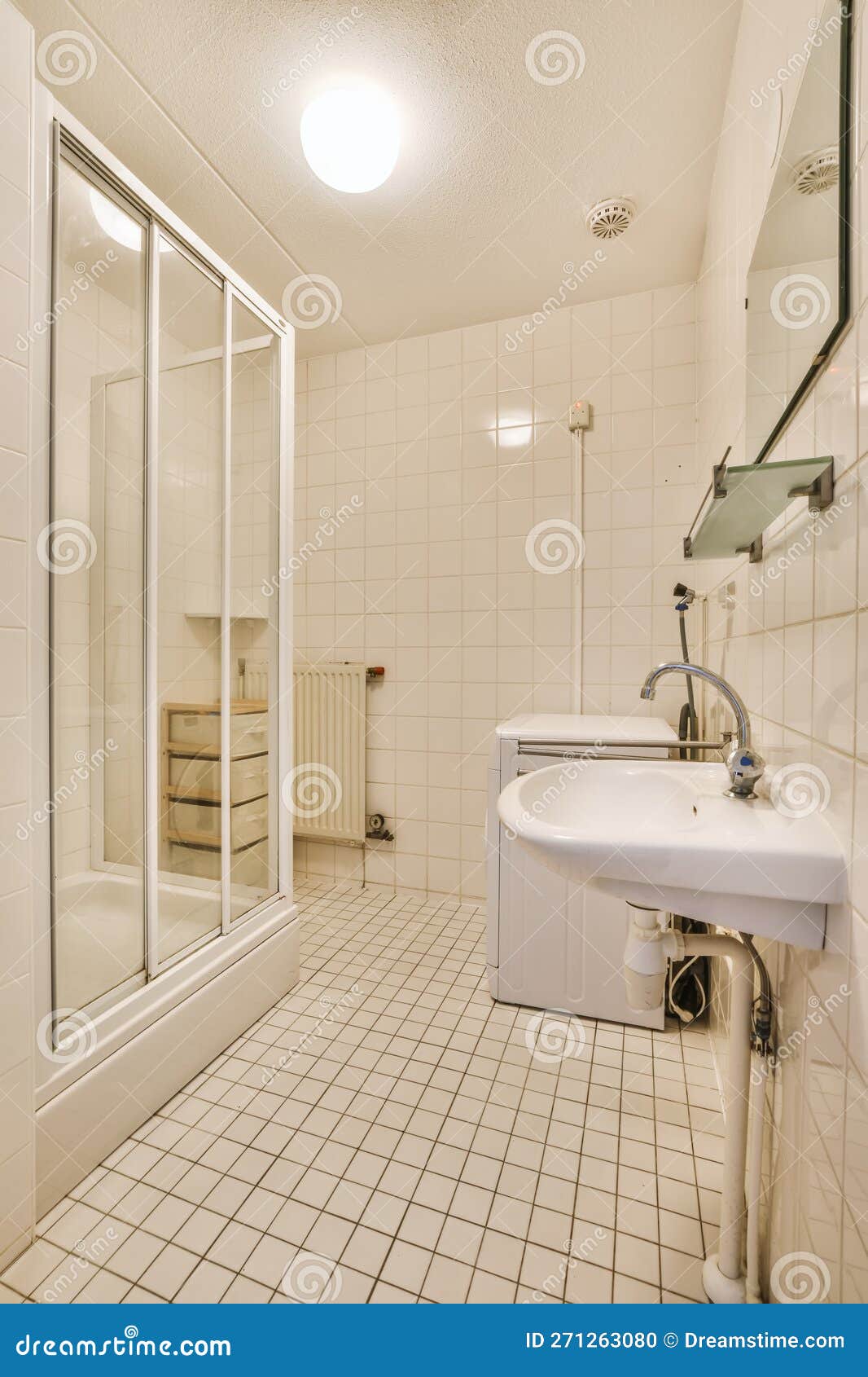 A White Bathroom with a Sink and a Shower Stock Photo Image of sink