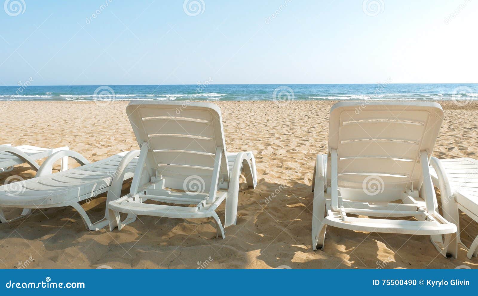 White Beach Chairs And Beds Near Sea Ocean Shore Stock Photo