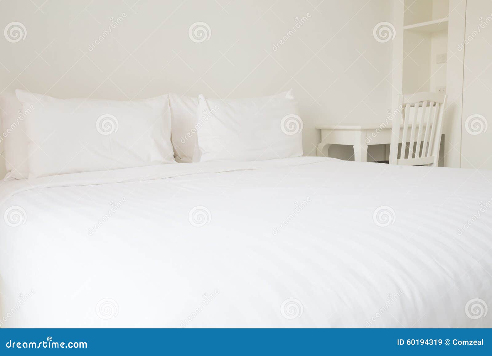 white bed sheets and pillows