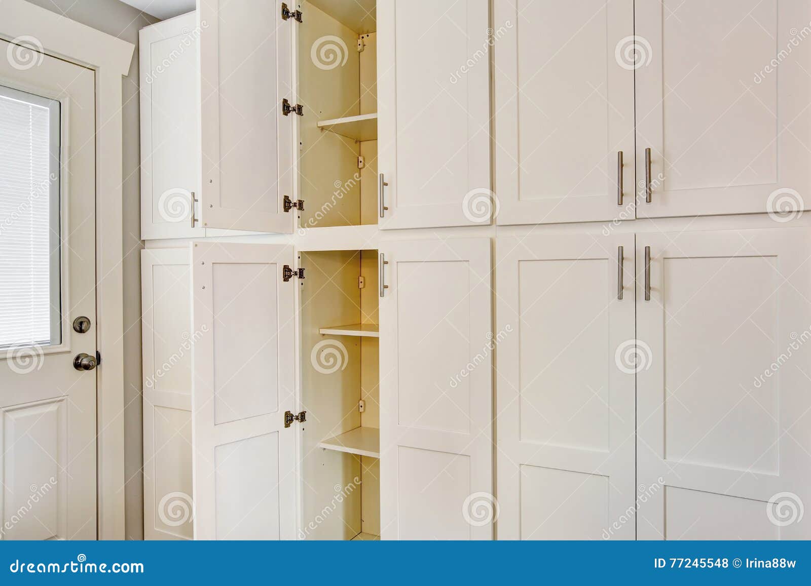 White Big Wooden Storage Combination for Kitchen Room Stock Photo