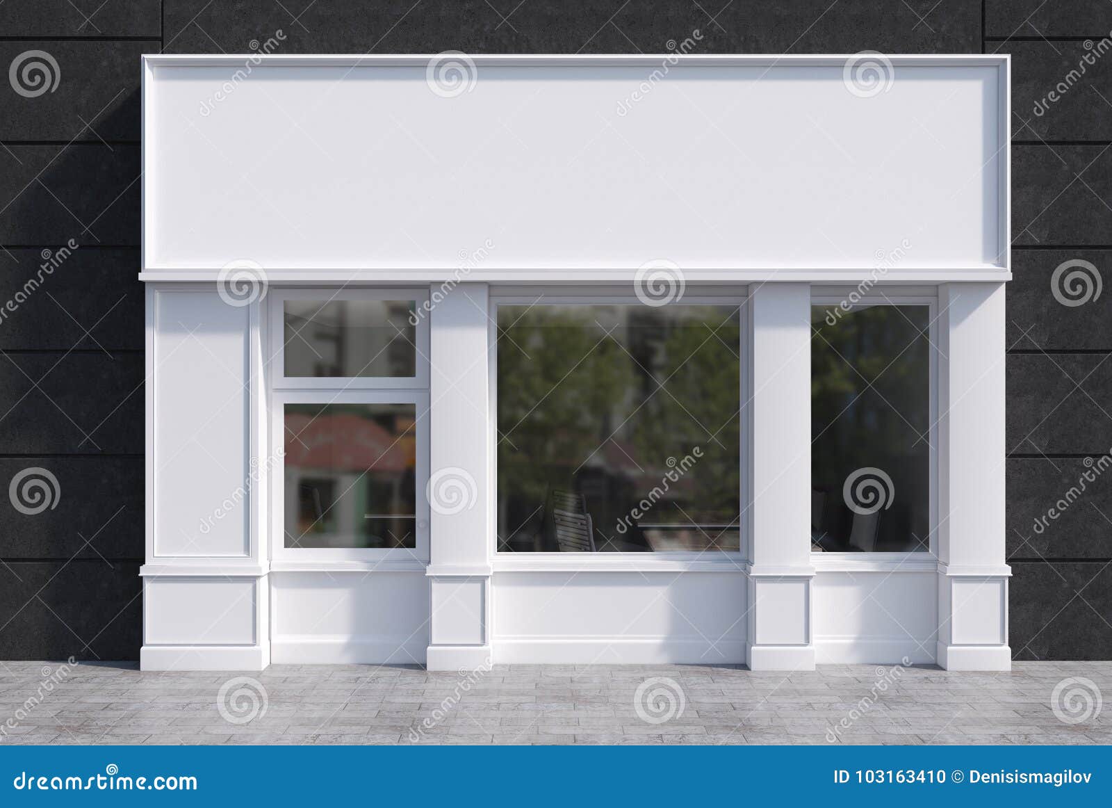 white and black cafe facade with a poster