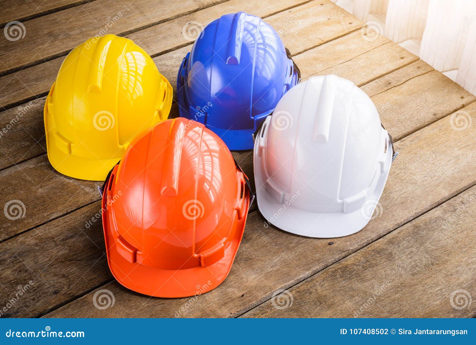 white, blue, orange, yellow hard safety helmet construction hat