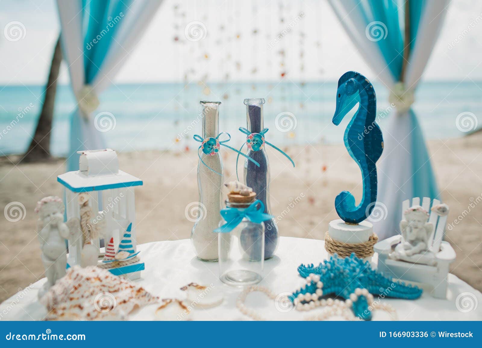 White and Blue Wedding Decorations on a ...