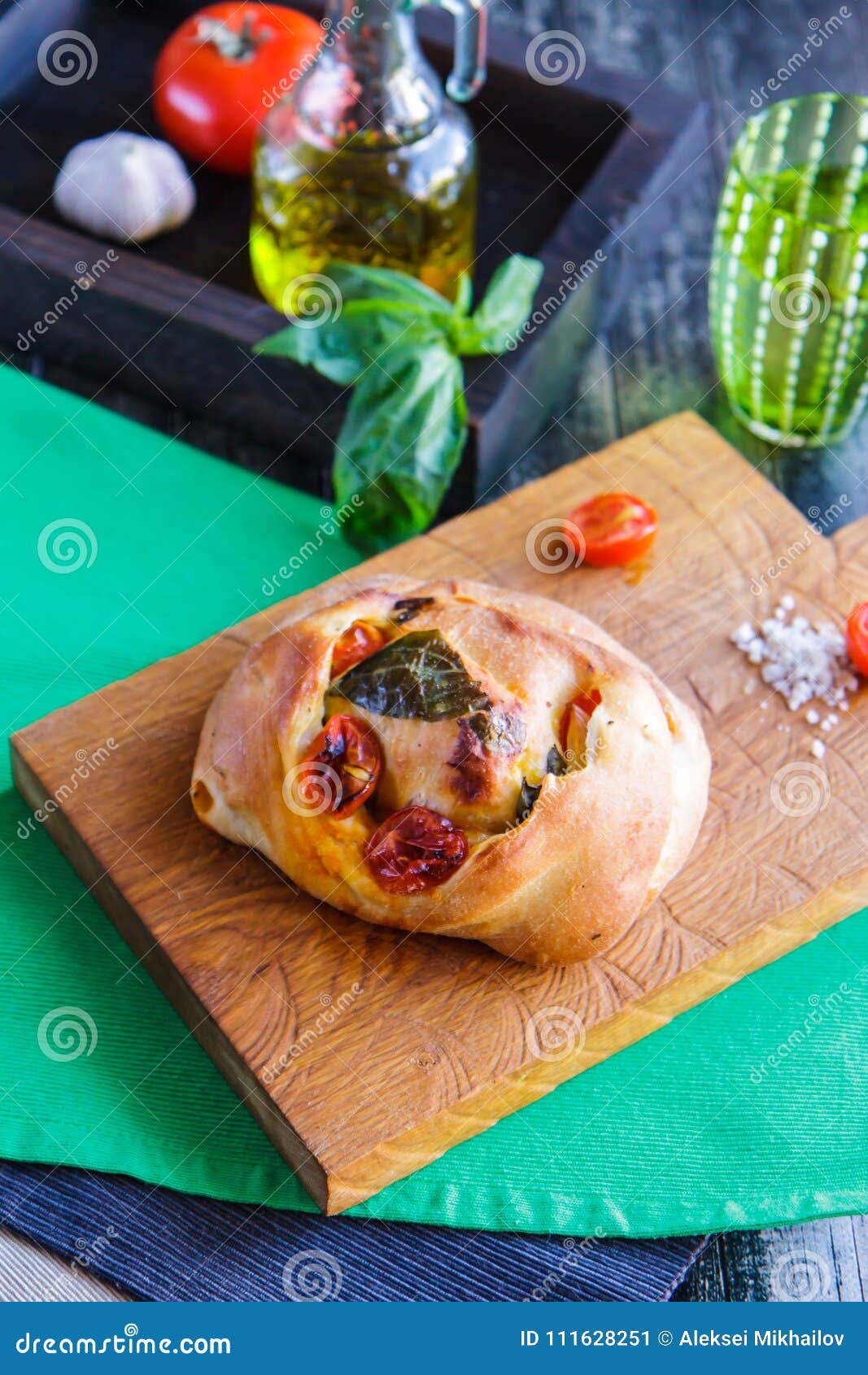 White Bread with Tomatoes and Basil on a Cutting Board Stock Image