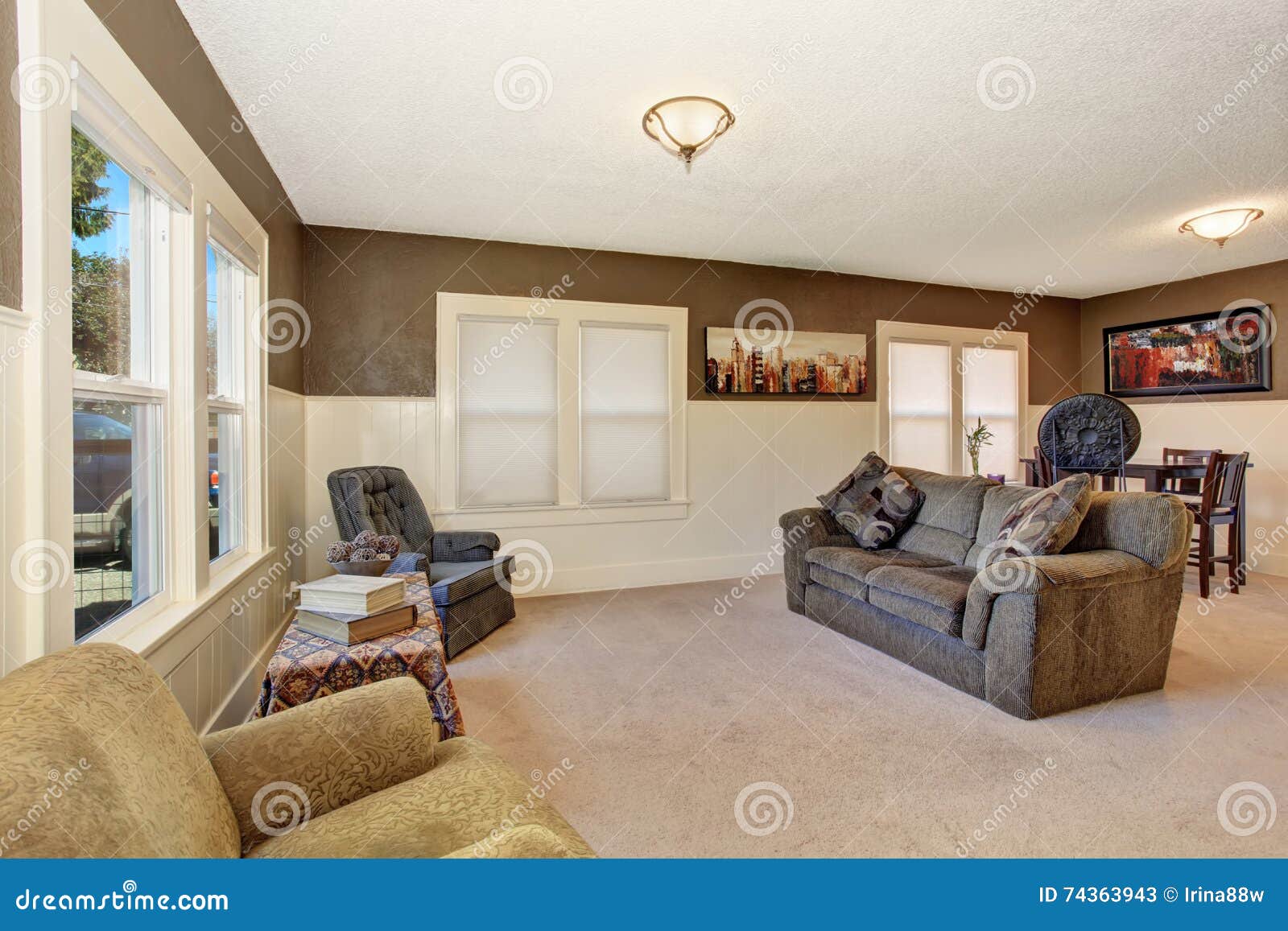 White and Brown Living Room Interior with Comfortable Sofa and Beige
