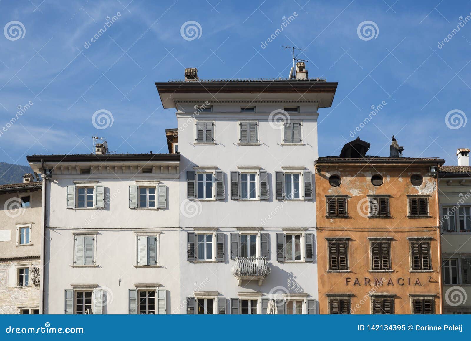 buildings at square piazza duomo, trento, italy