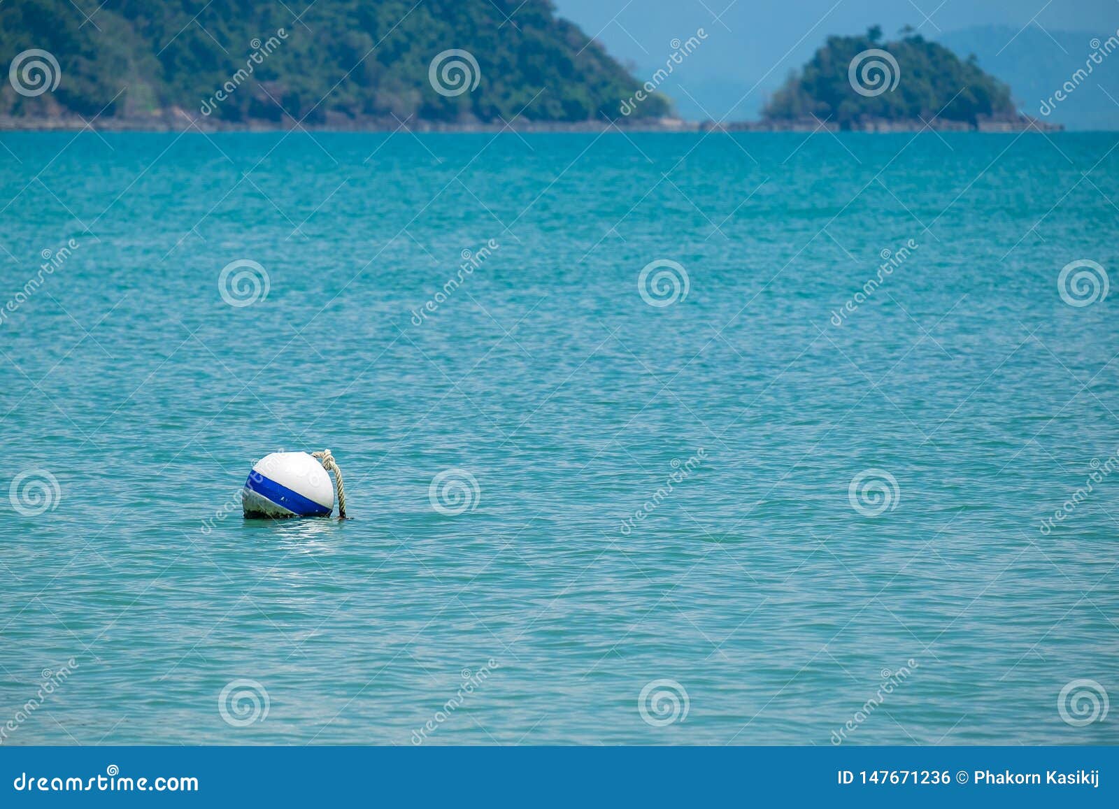 white buoyancy ball floating in the sea