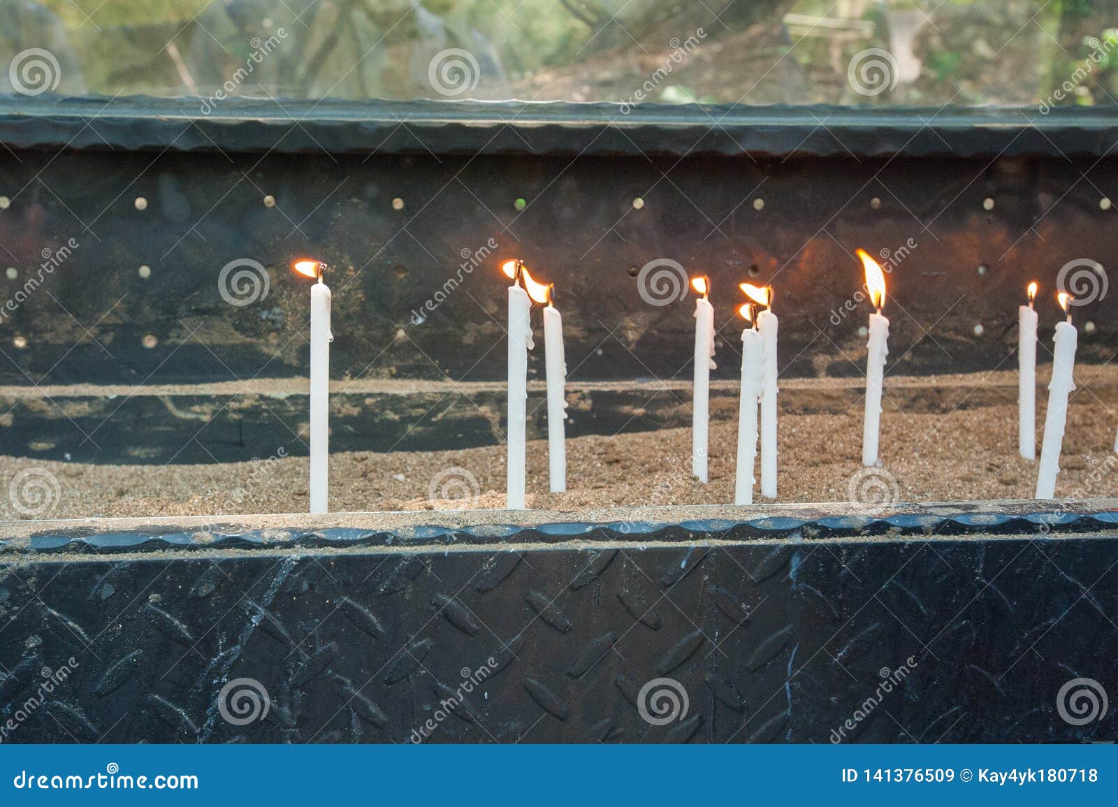 White Burning Candles Stand on the Sand Stock Image Image of attributes, angel 141376509