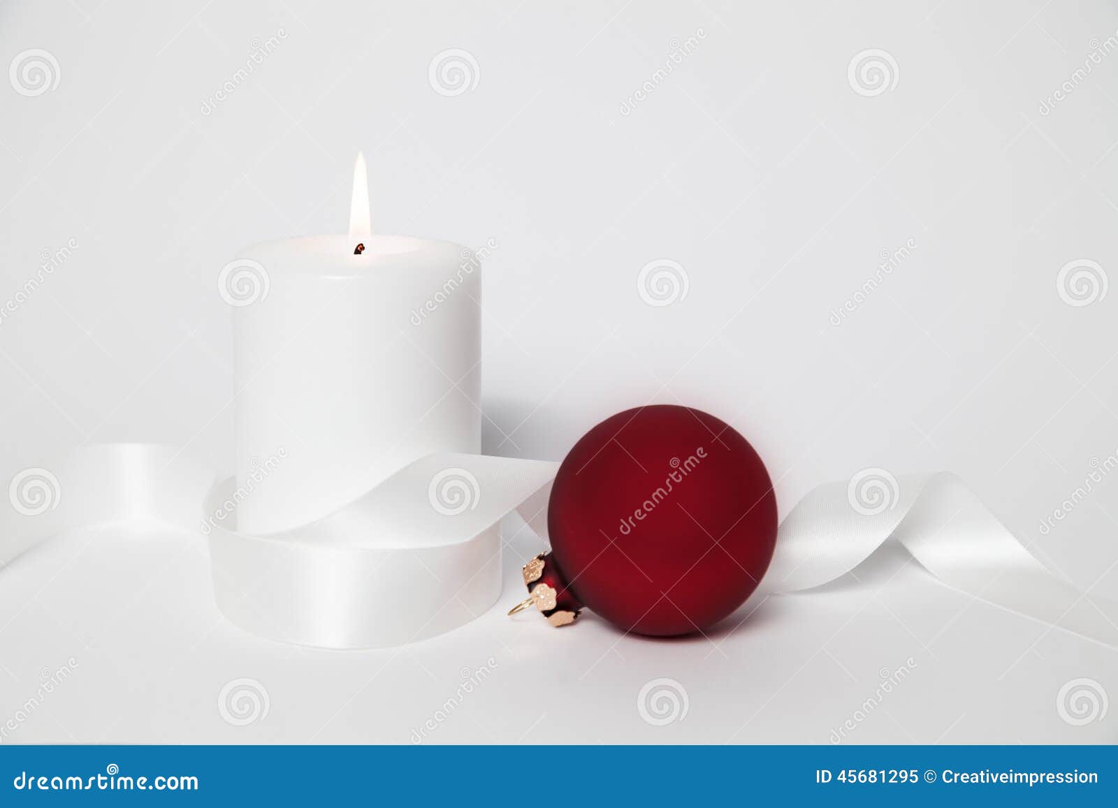 White Candle and Christmas Ball Stock Image Image of december