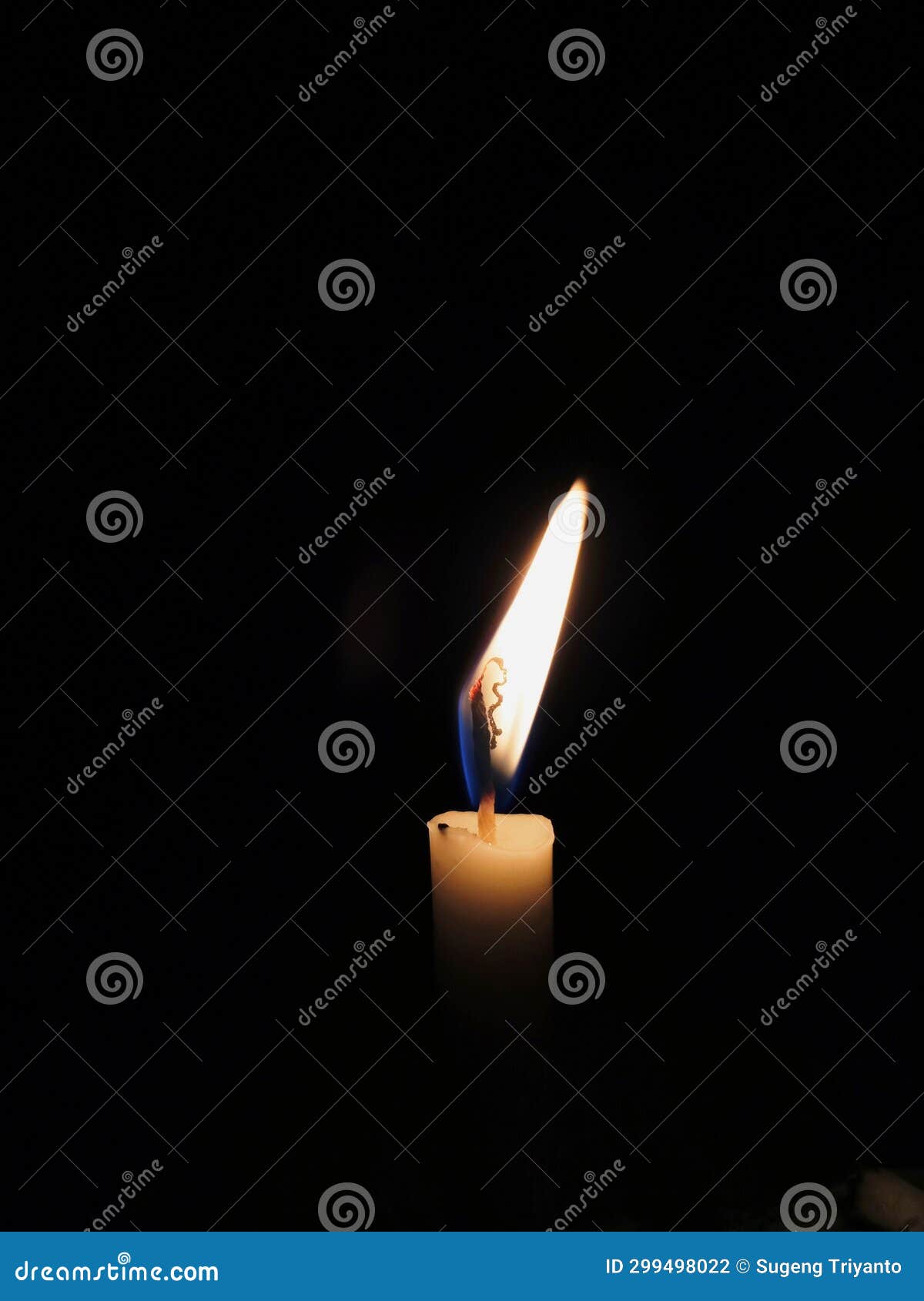A White Candle Whose Wick Burned with a Bright Red Flame in the