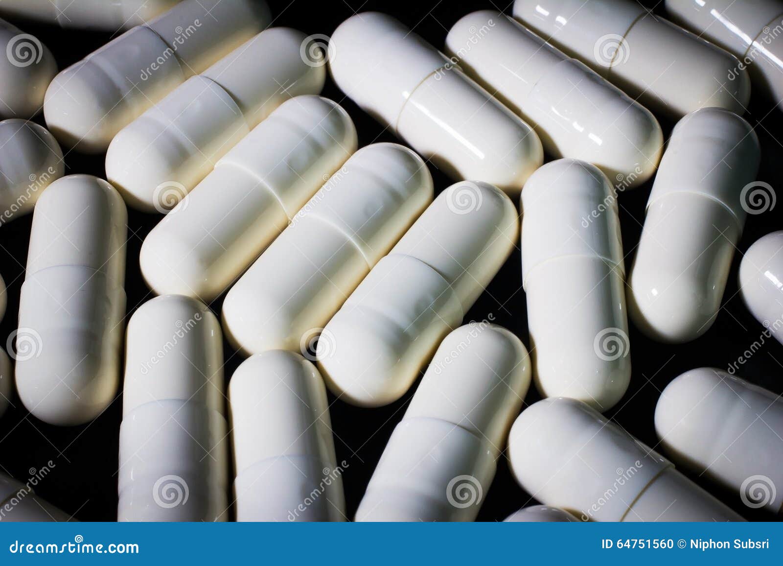 White capsule stock photo. Image of black, remedy, vitamin 64751560