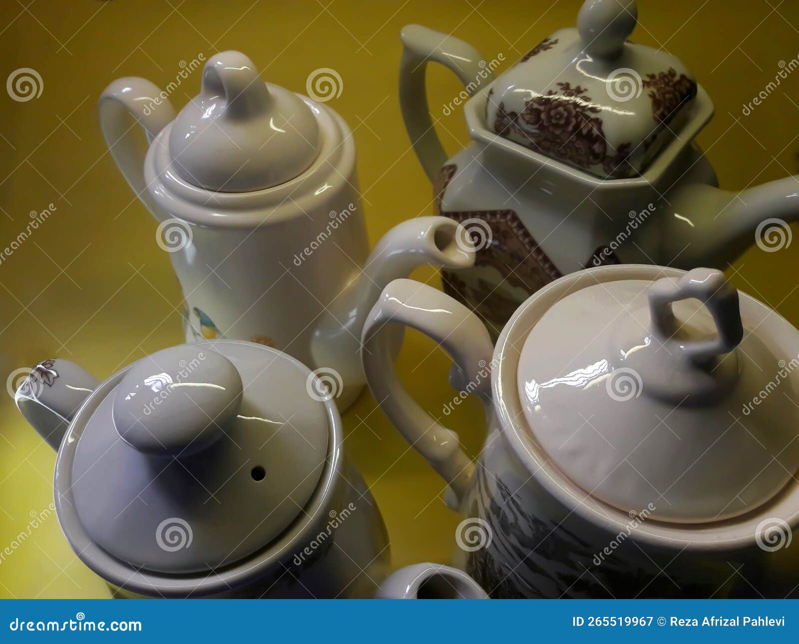White Ceramic Teapot on a Yellow Background Stock Image Image of