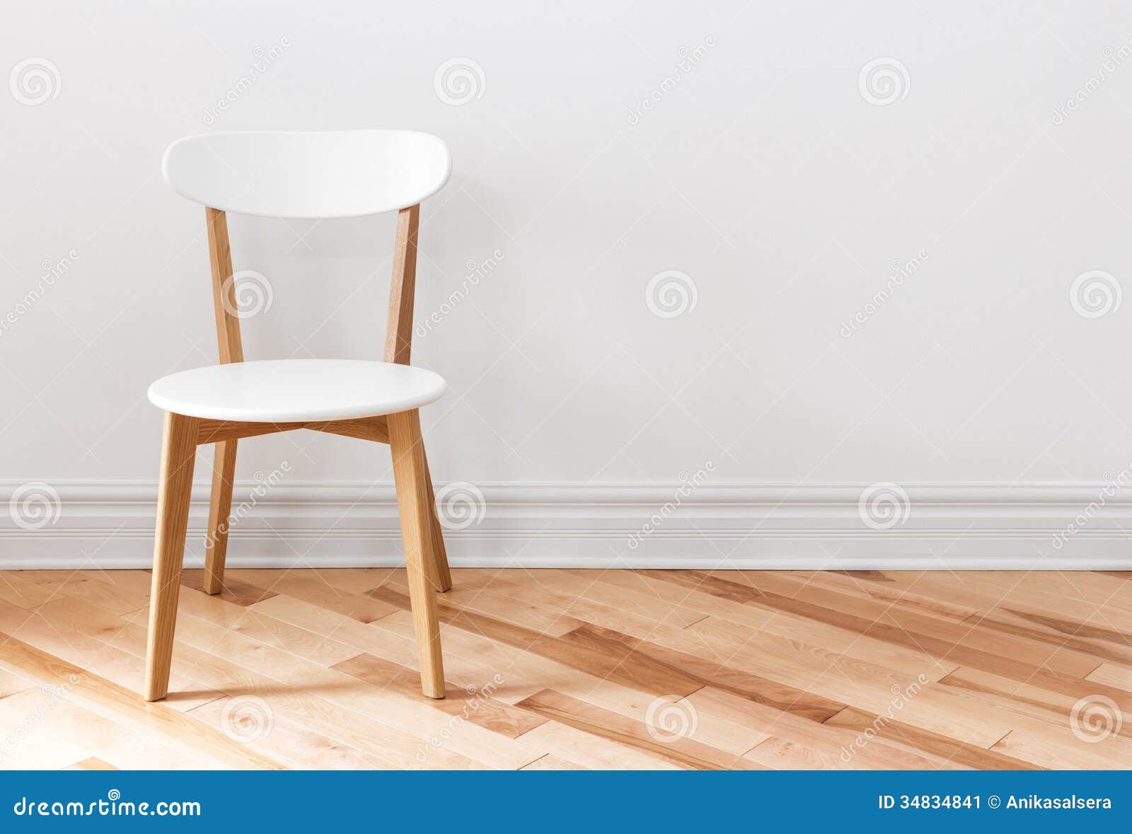 white chair in an empty room