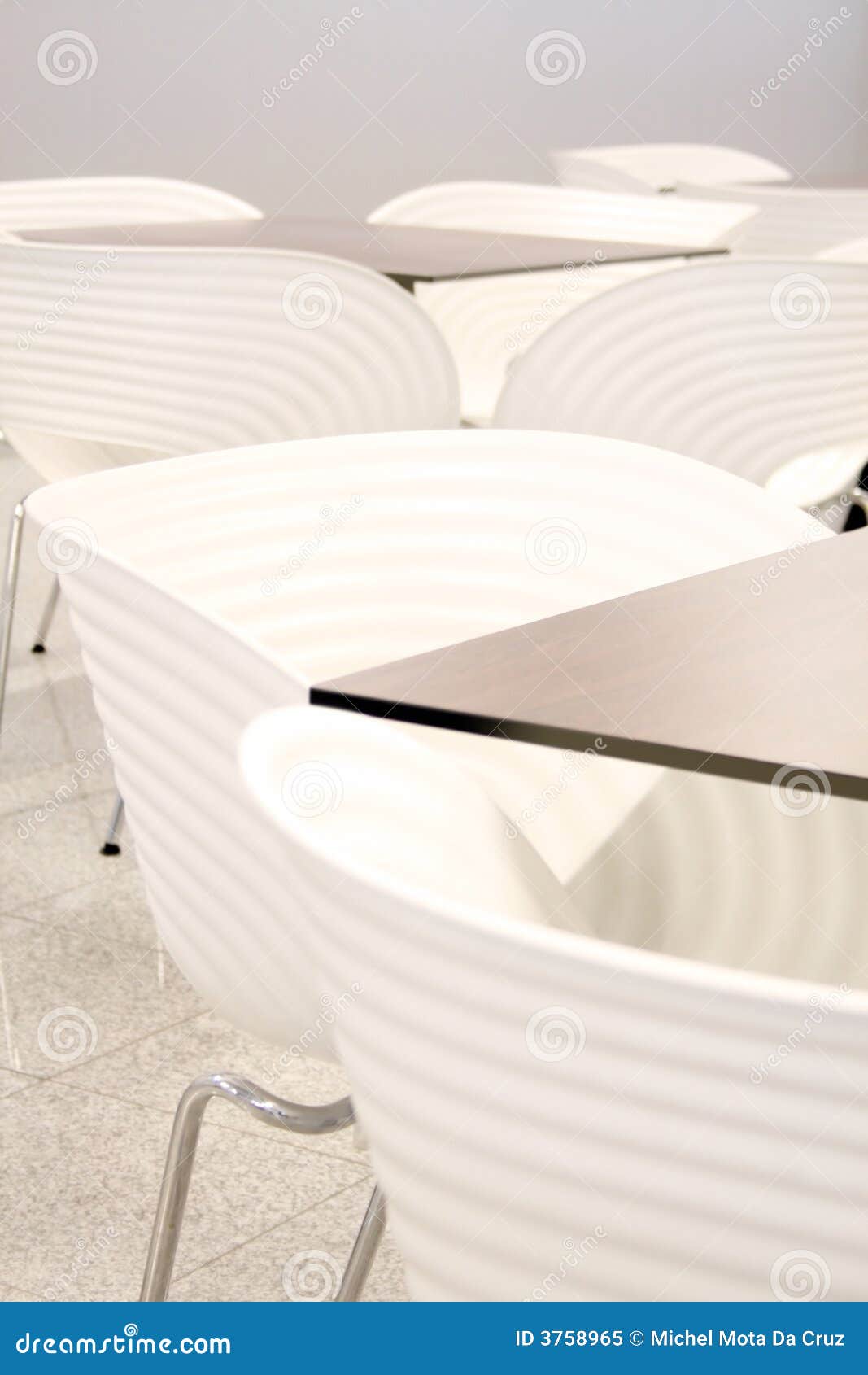 white chairs with tables