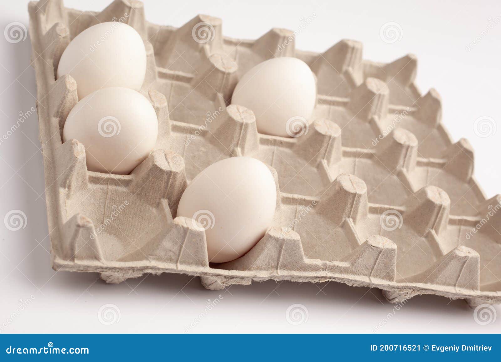 4 white chicken eggs stock image. Image of brown, group 200716521