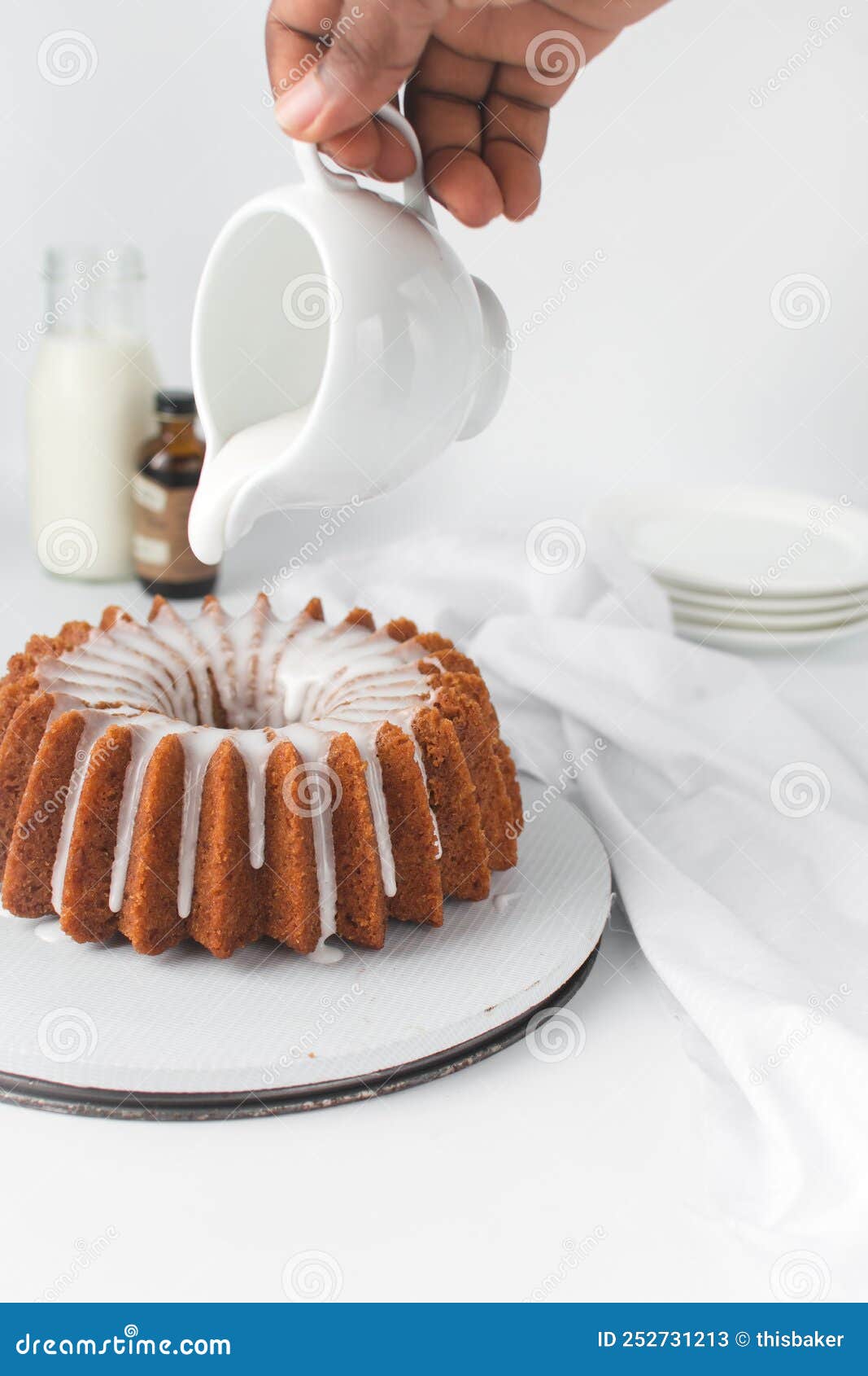 White Chocolate and Coffee Bundt Cake with Icing Glaze Stock Image