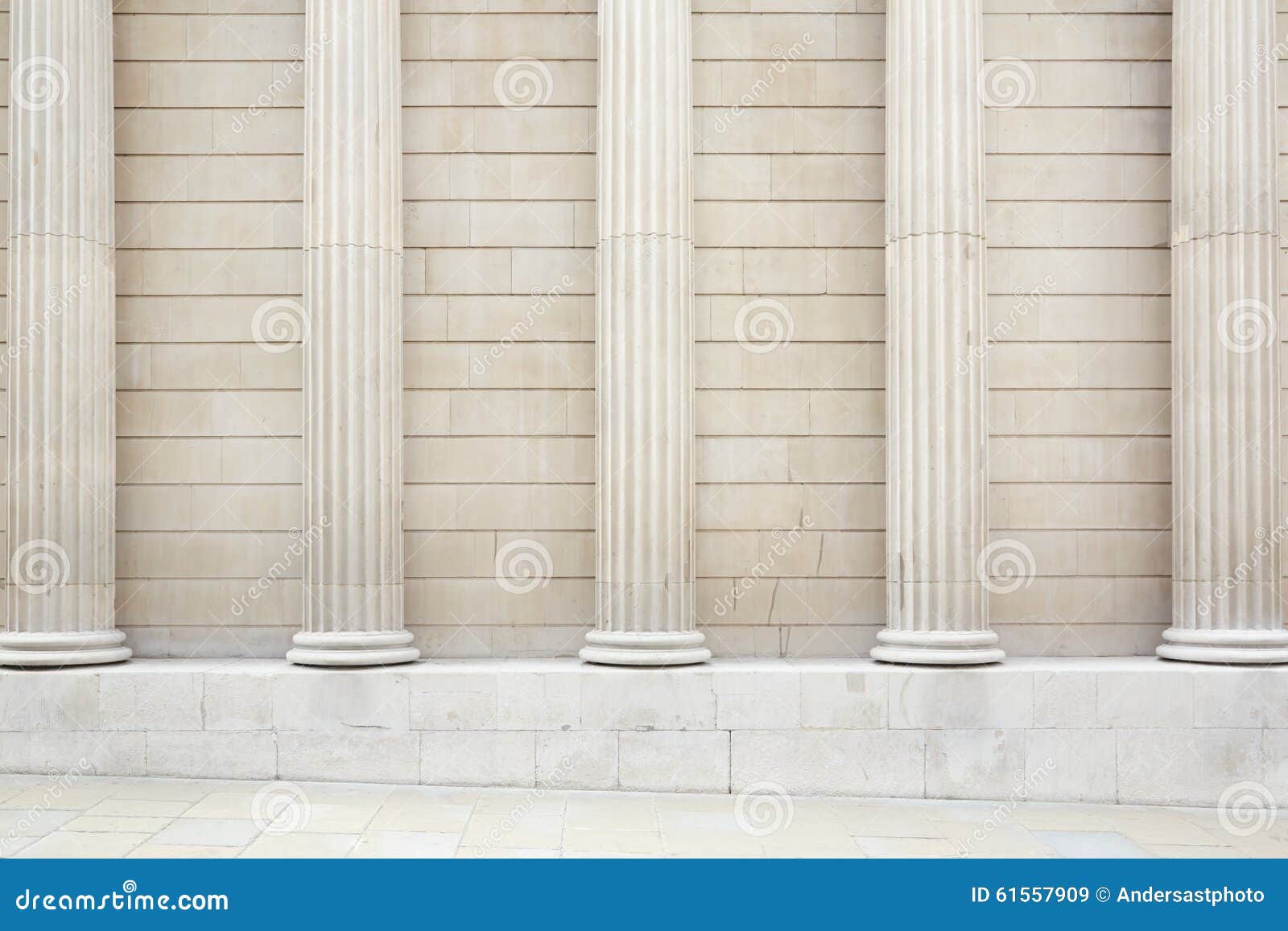 white classical columns and wall background