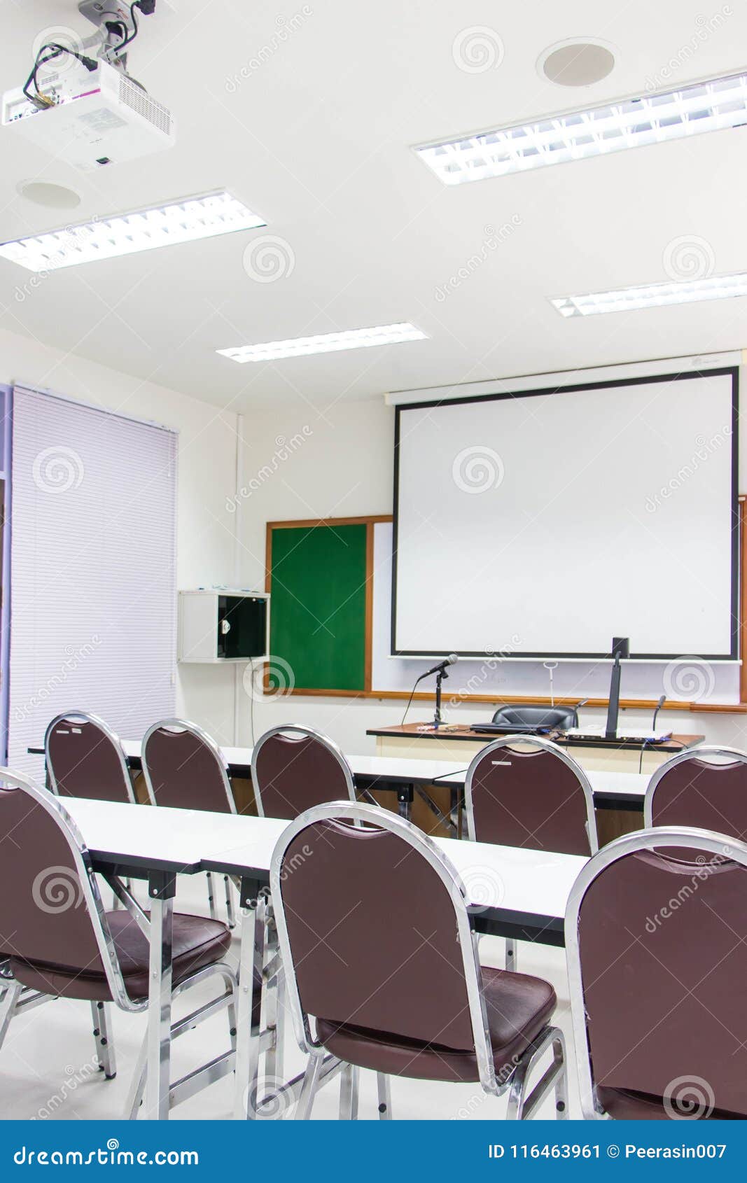 white classrooms are currently available with student desks and chairs