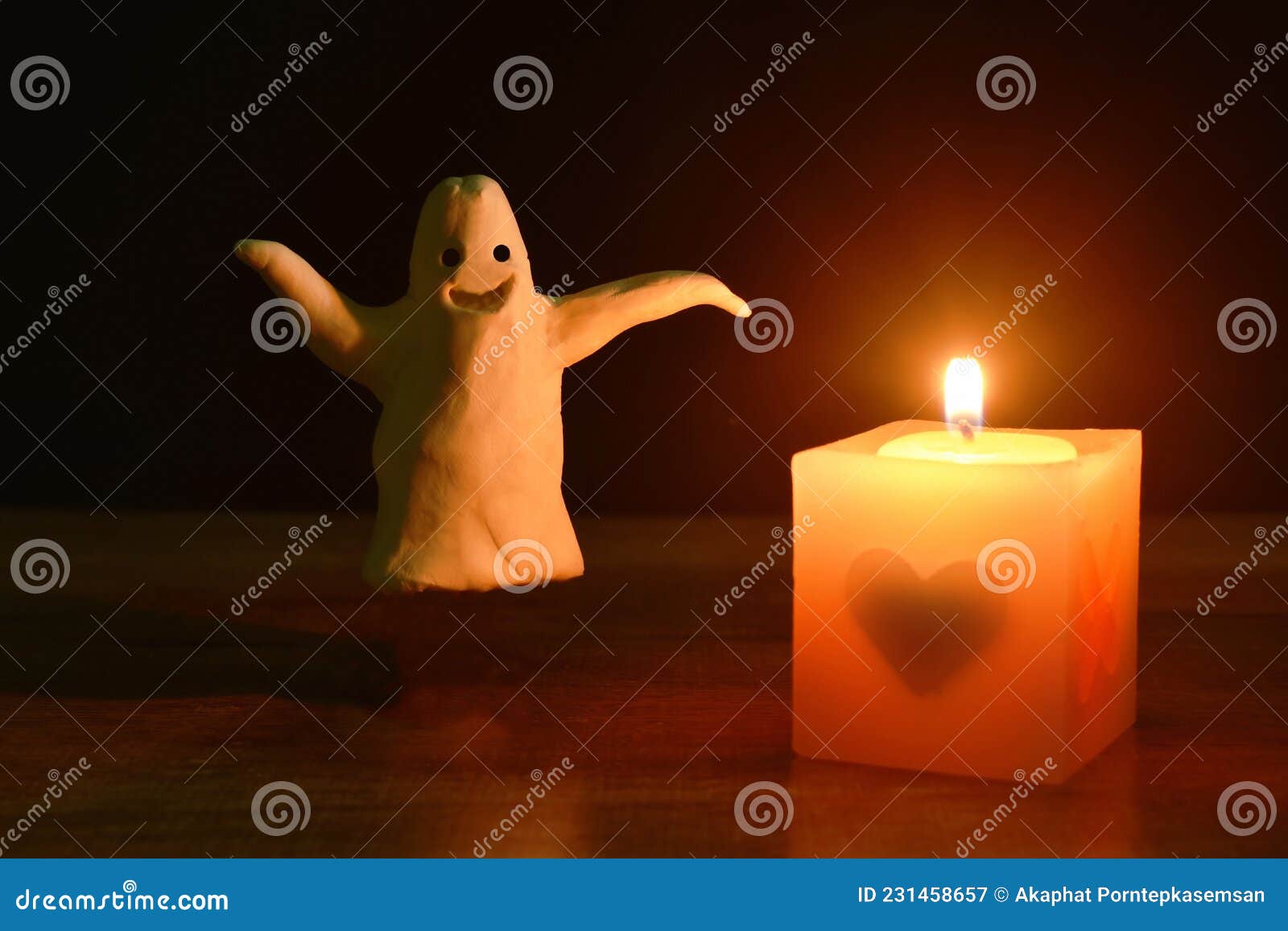 White Clay Ghost Haunted and Light Candle in Halloween Night Stock