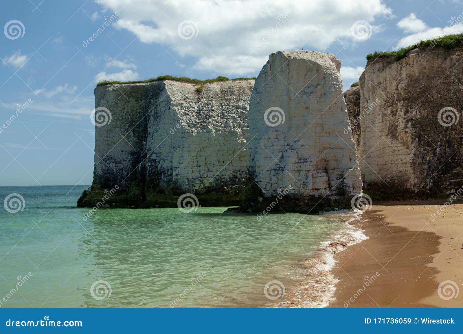 White Cliffs of Dover Surrounded by the Sea and the Beach Under the