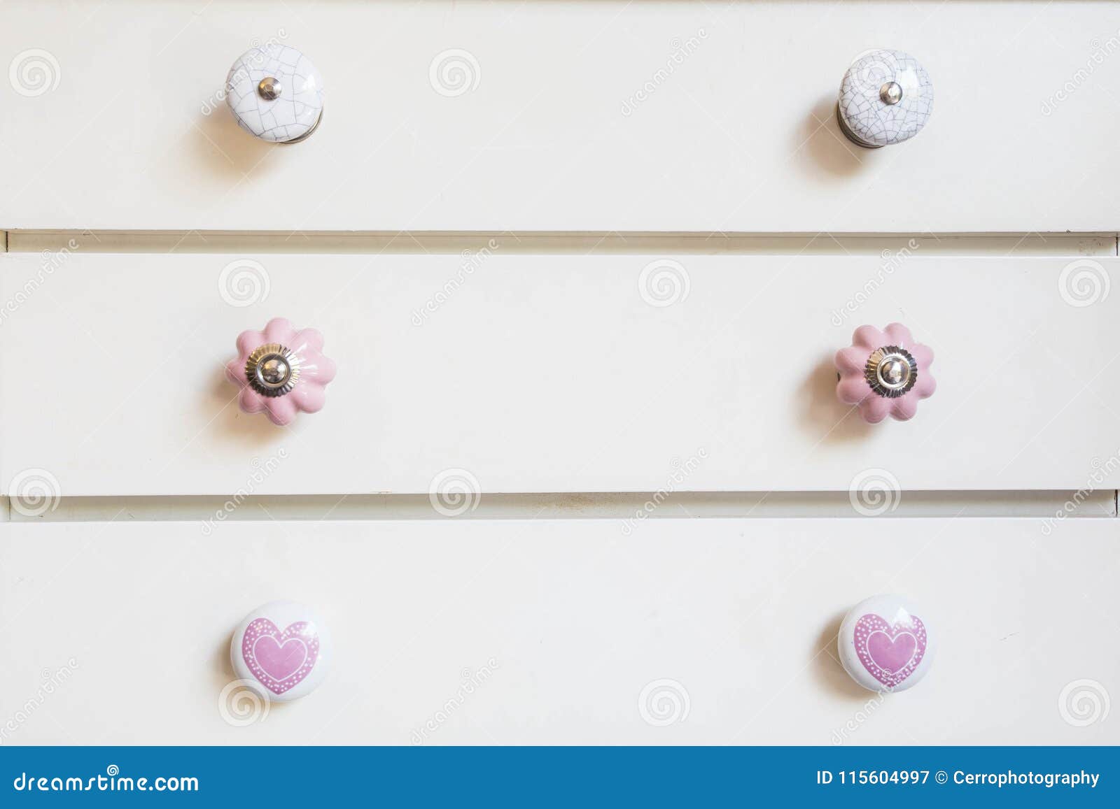 White Closet Doors with Colorful Knobs Stock Image Image of doorknob