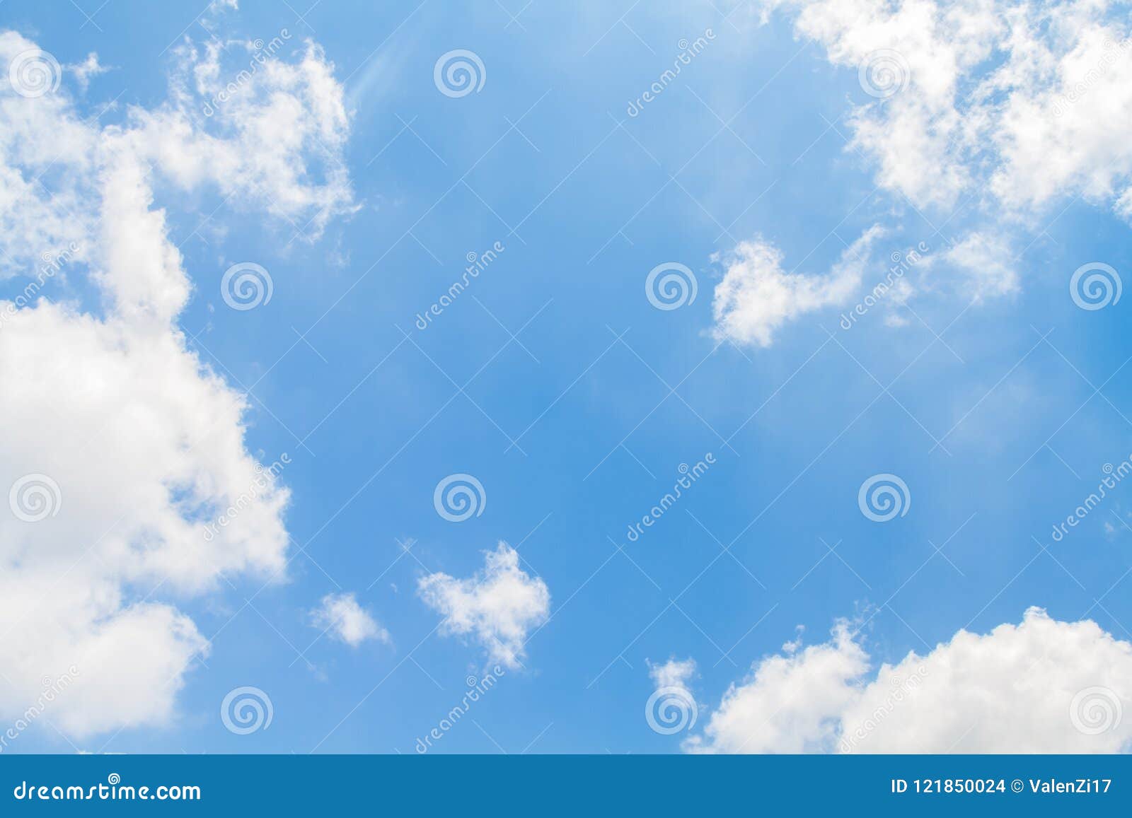 White clouds on a blue sky stock photo. Image of view - 121850024