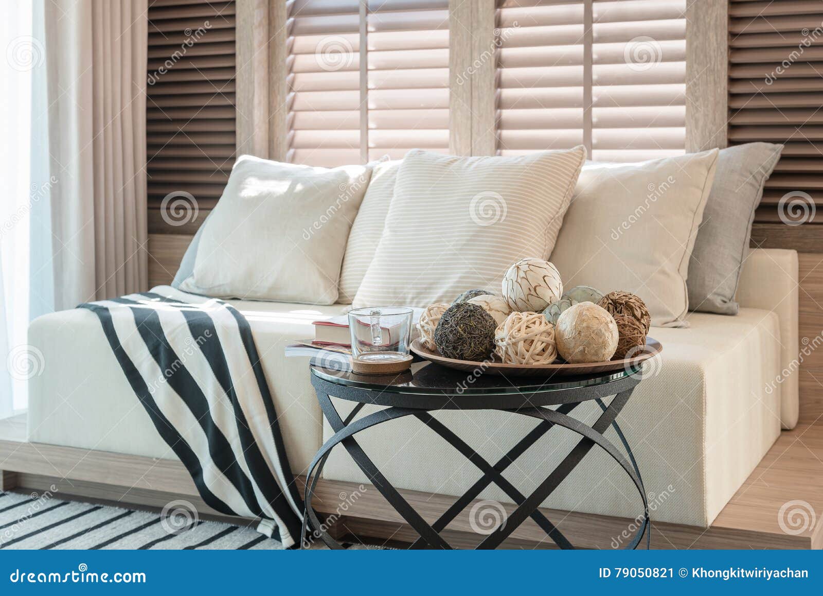White Color Set of Pillows and Sofa in Modern Living Room Stock Image