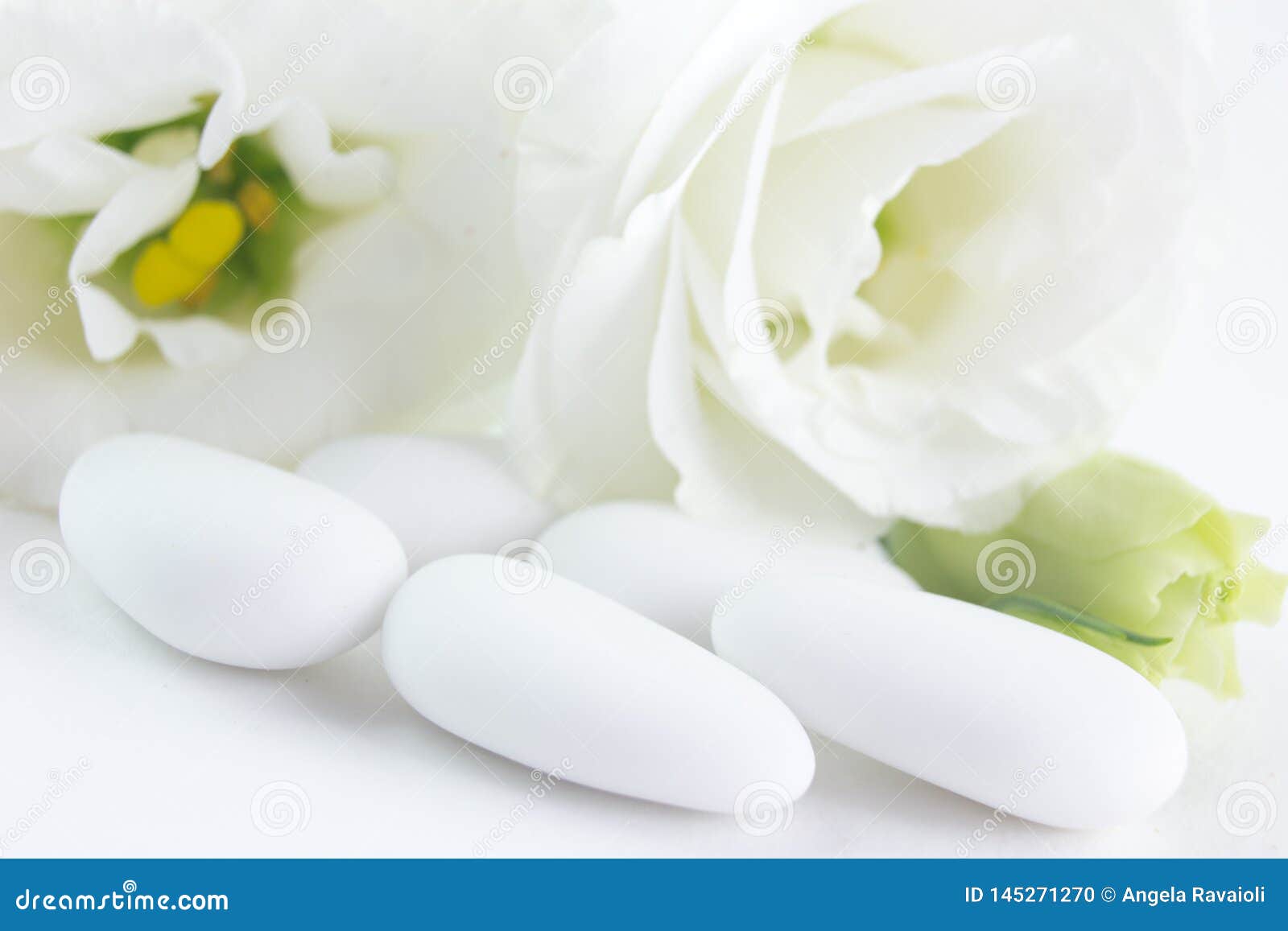 White Confetti Stuffed with Almonds Stock Photo Image of glass