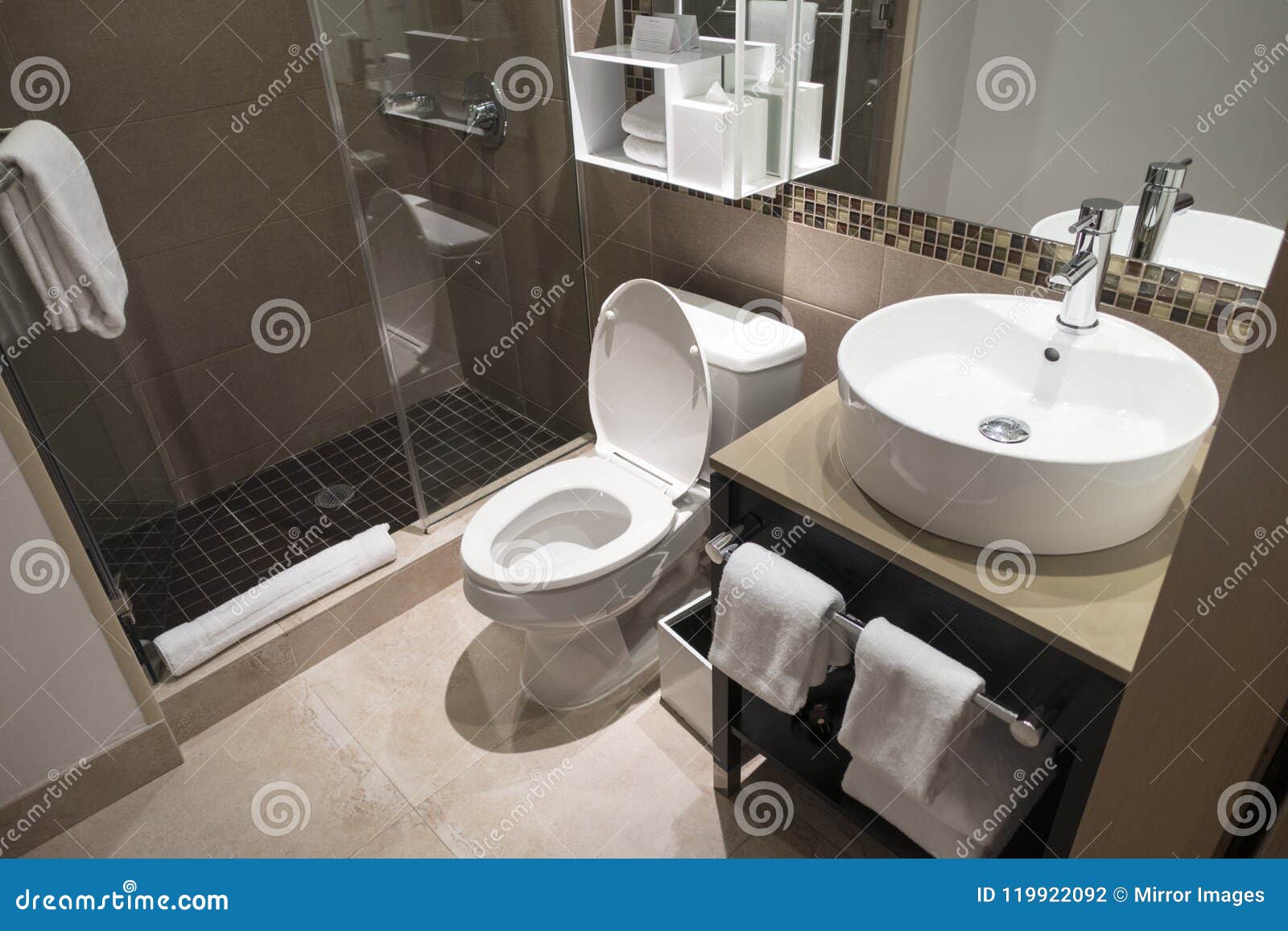 Modern Bathroom Sink And Toilet And Staning Shower With Glass Shower Doors Stock Photo Image Of Sink