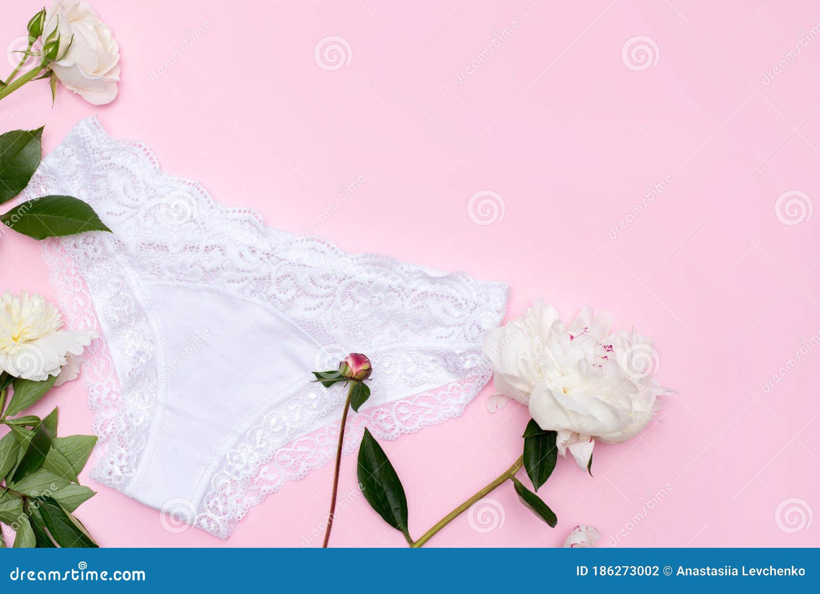 White Cotton Panties with Flowers on Pink Background. Woman Underwear ...