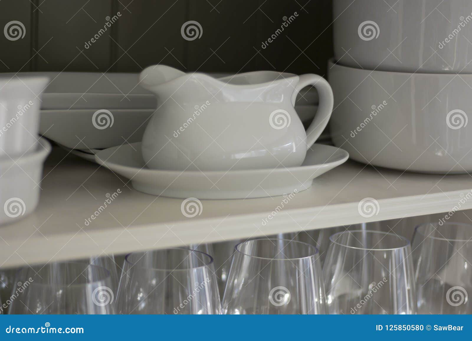 White Dishes and Glasses in a White Cupboard Stock Photo Image of