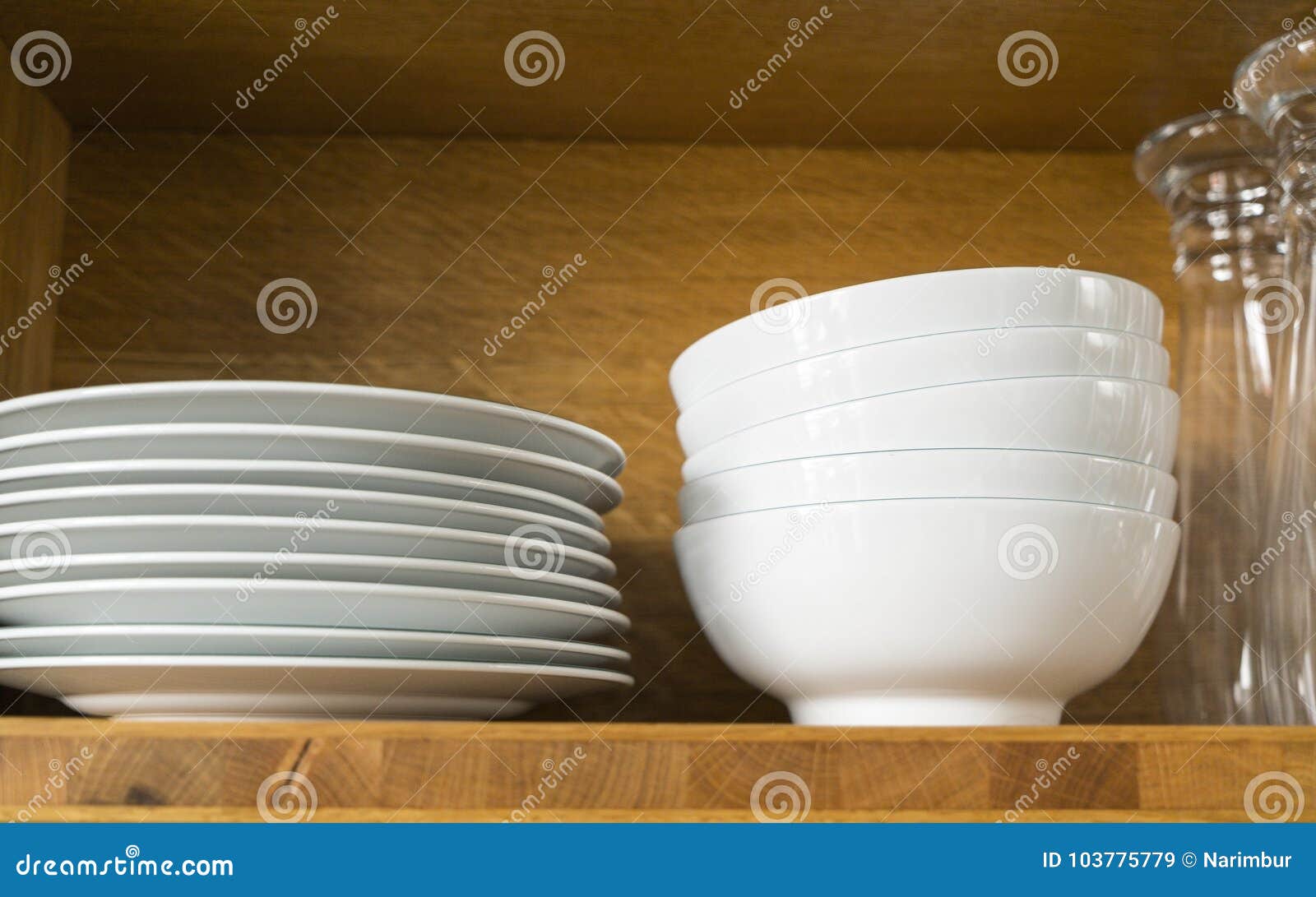 White dishes and glasses stock image. Image of plate 103775779