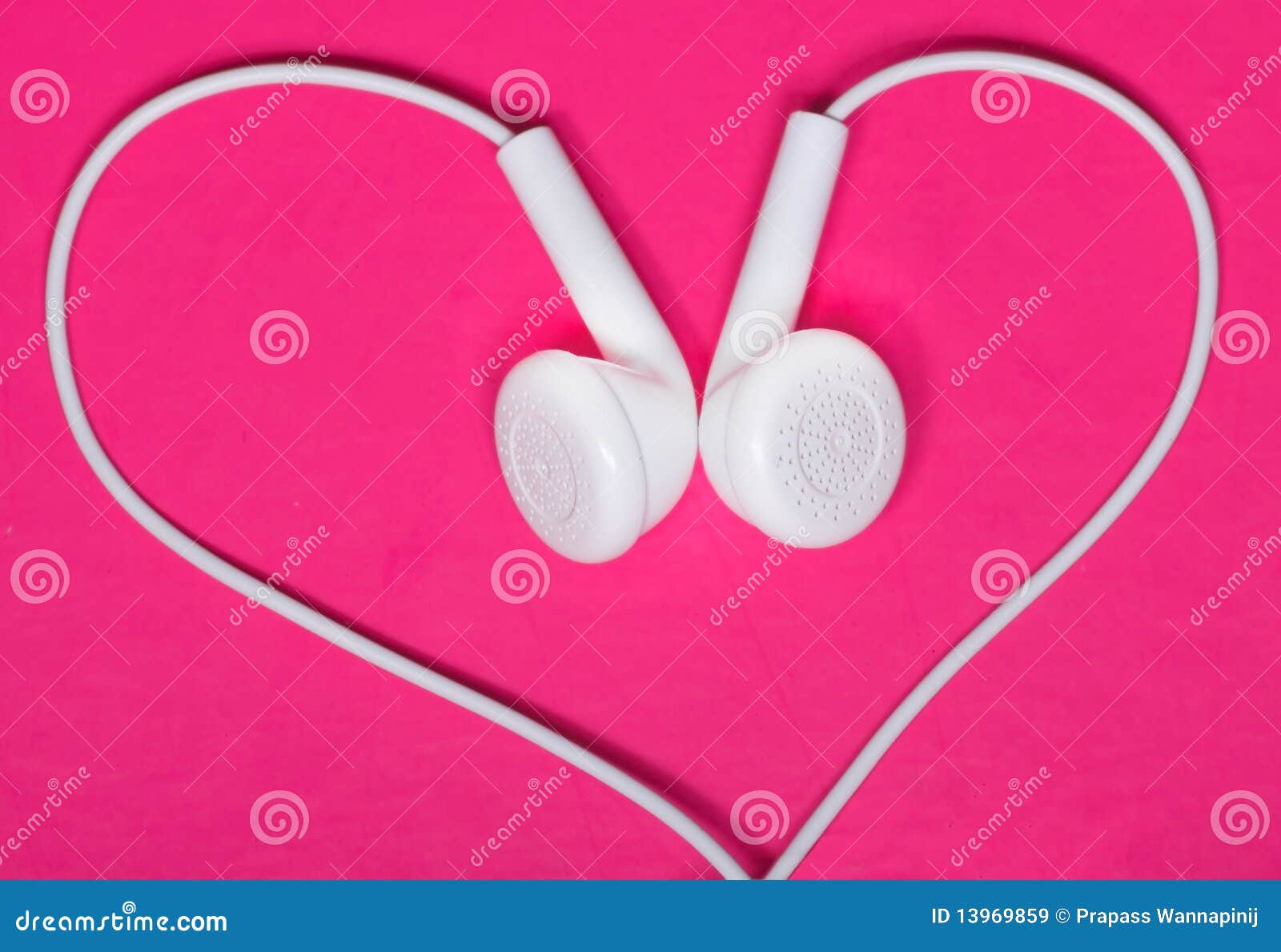 white earphone on pink background, heart