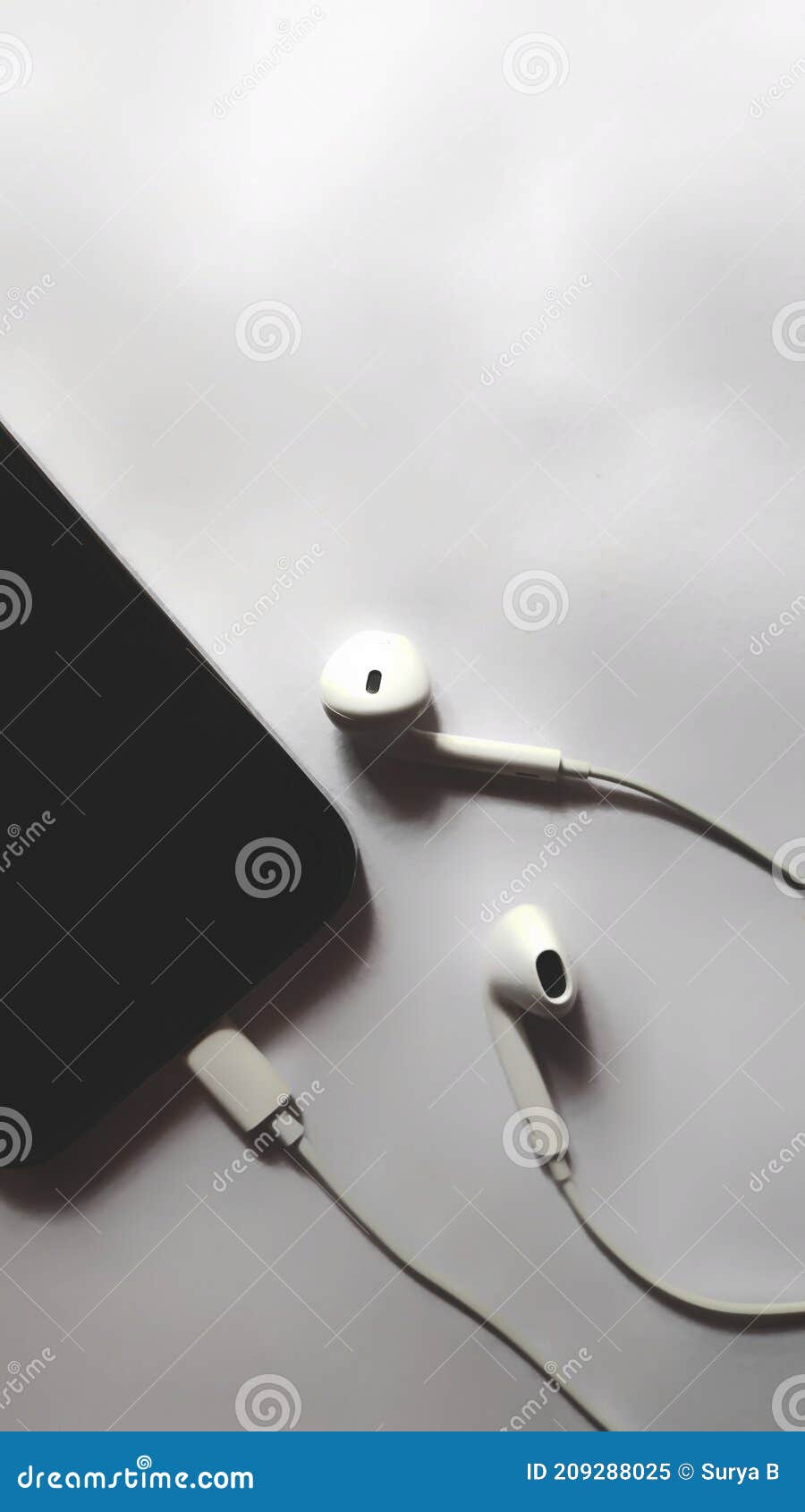White Earphones, with Mobile, Headphones Wallpapers in Black Background.  Wallpaper Photos. Stock Image - Image of perfect, white: 209288025