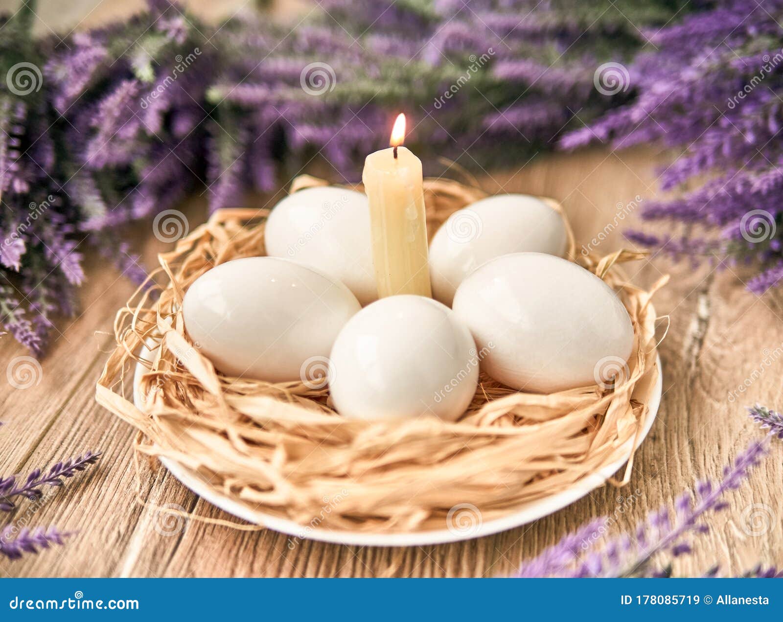White Easter Eggs with Lighting Candle. Happy Easter Concept